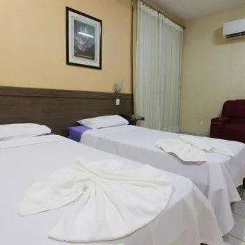 Bed in Augustu's Hotel