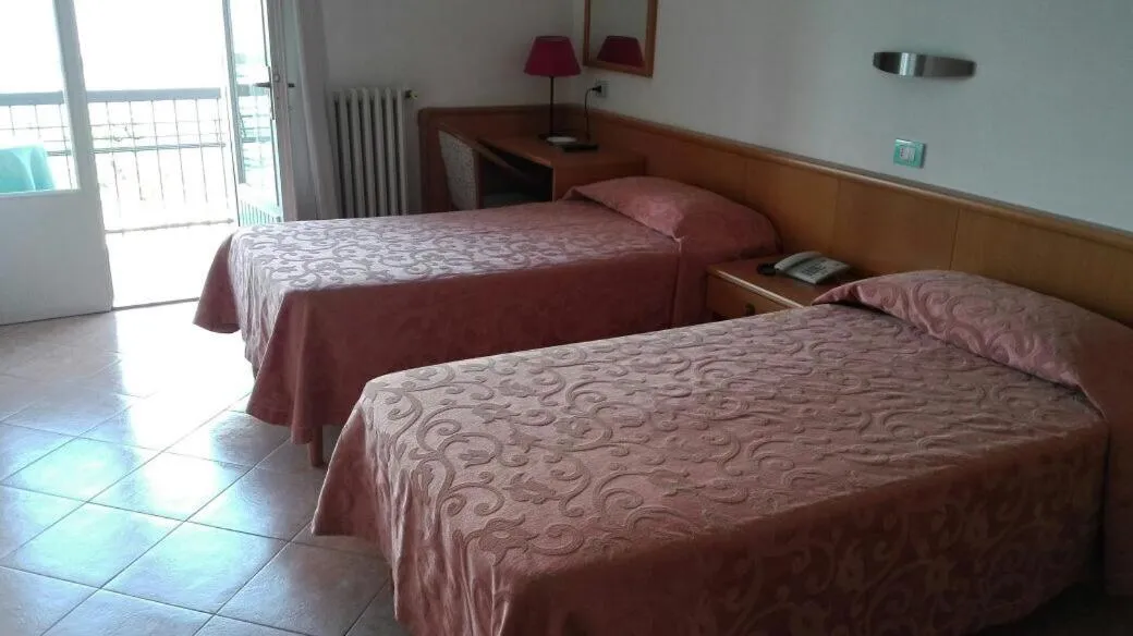 Photo of the whole room, Bed in Piccolo Hotel Direkt am See