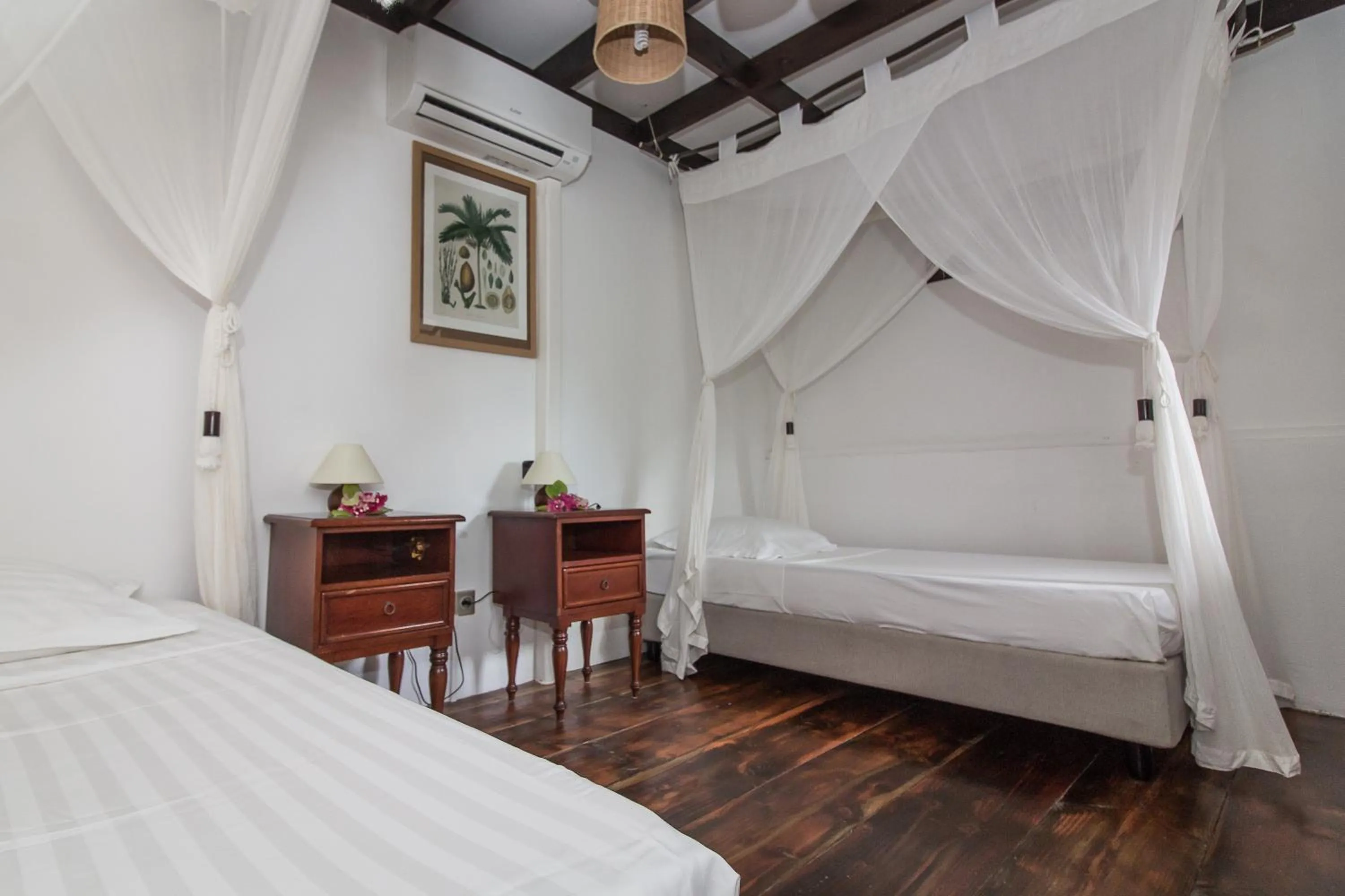 Bed in Le Coconut Lodge