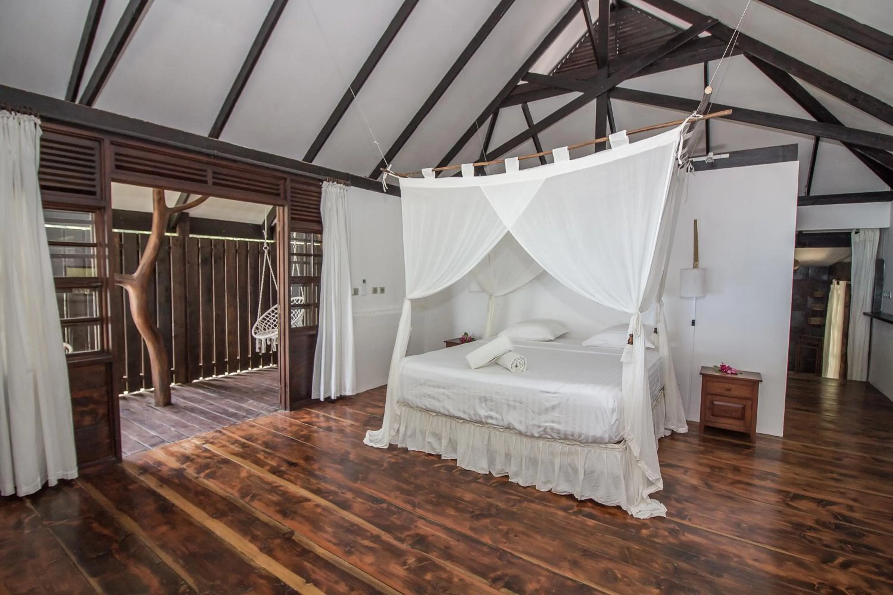 Bed in Le Coconut Lodge