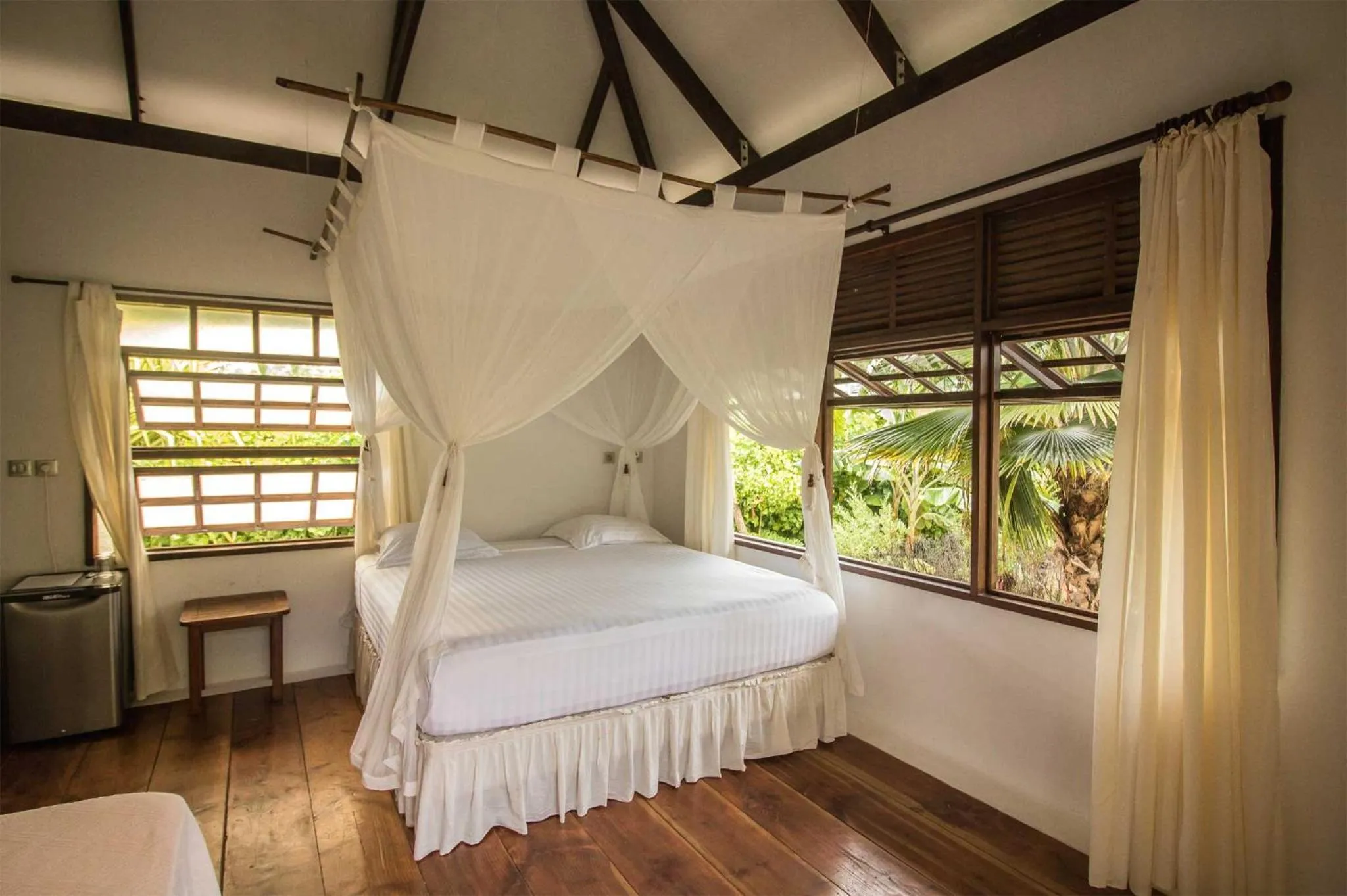 Photo of the whole room, Bed in Le Coconut Lodge