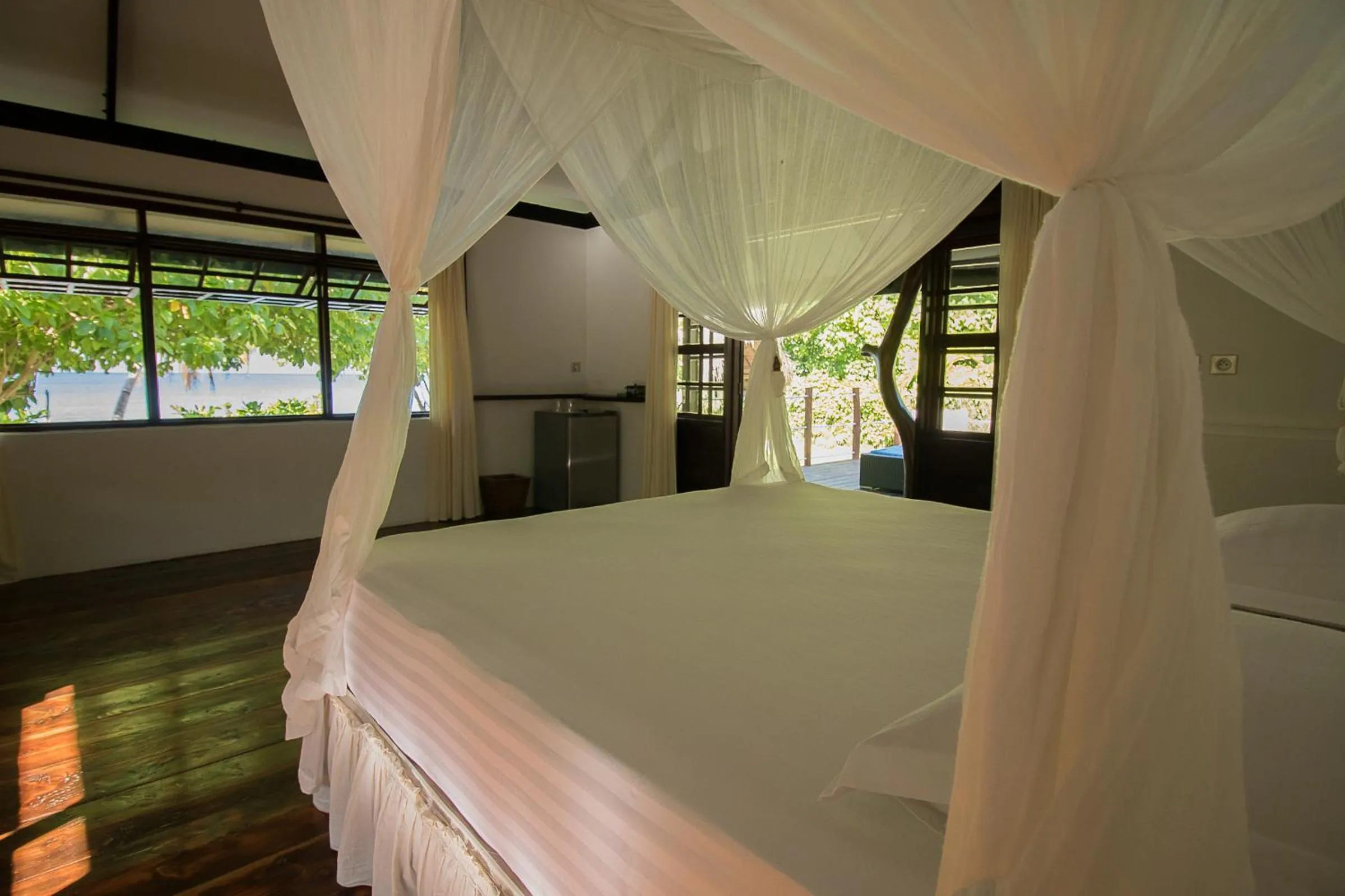 Bed in Le Coconut Lodge