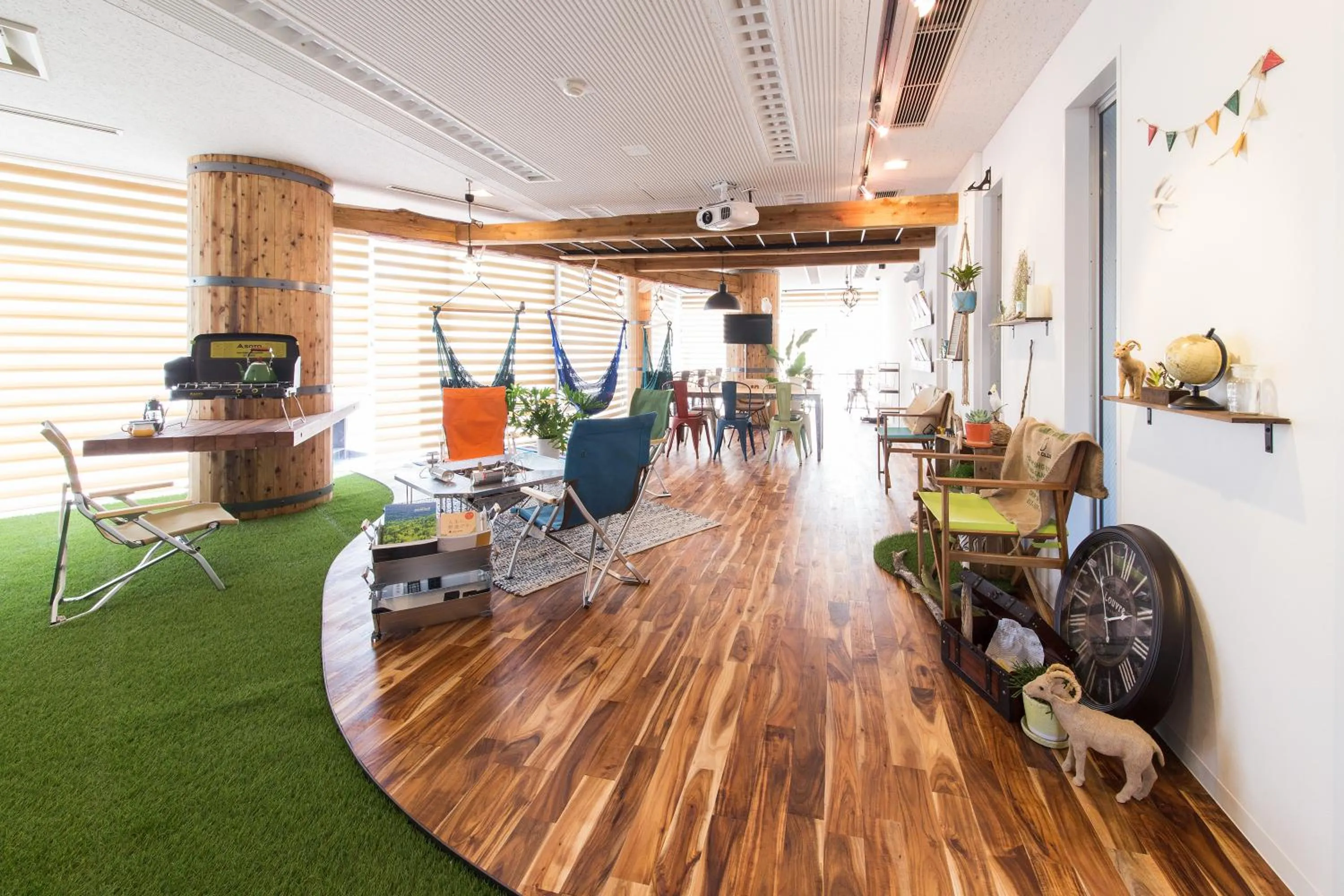 Communal lounge/ TV room in 365BASE outdoor hostel