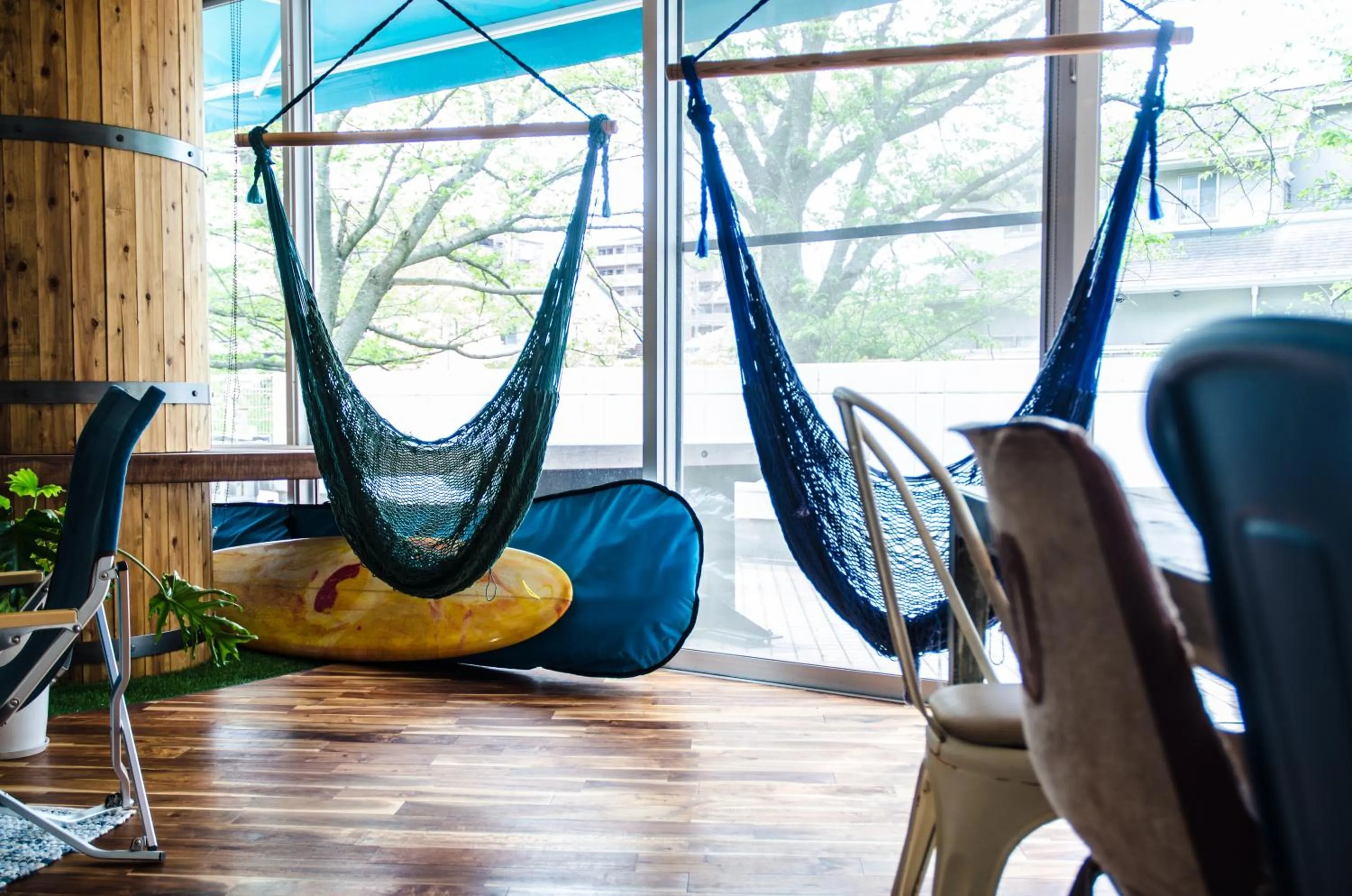 Communal lounge/ TV room in 365BASE outdoor hostel