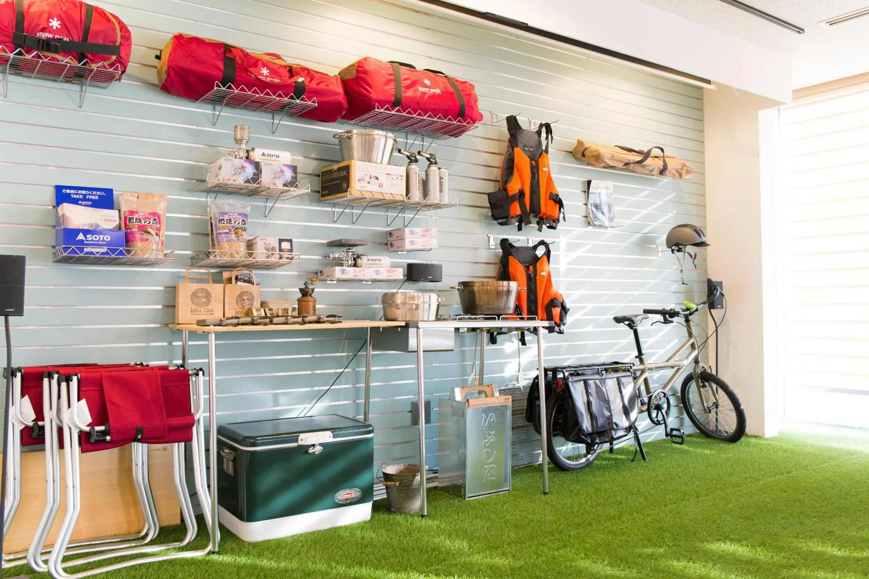 Communal lounge/ TV room in 365BASE outdoor hostel