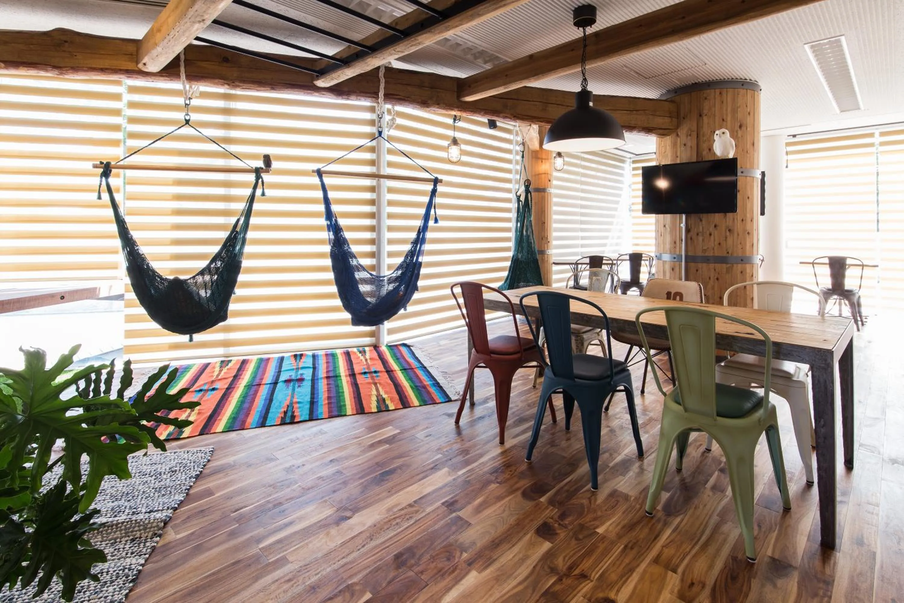 Communal lounge/ TV room in 365BASE outdoor hostel