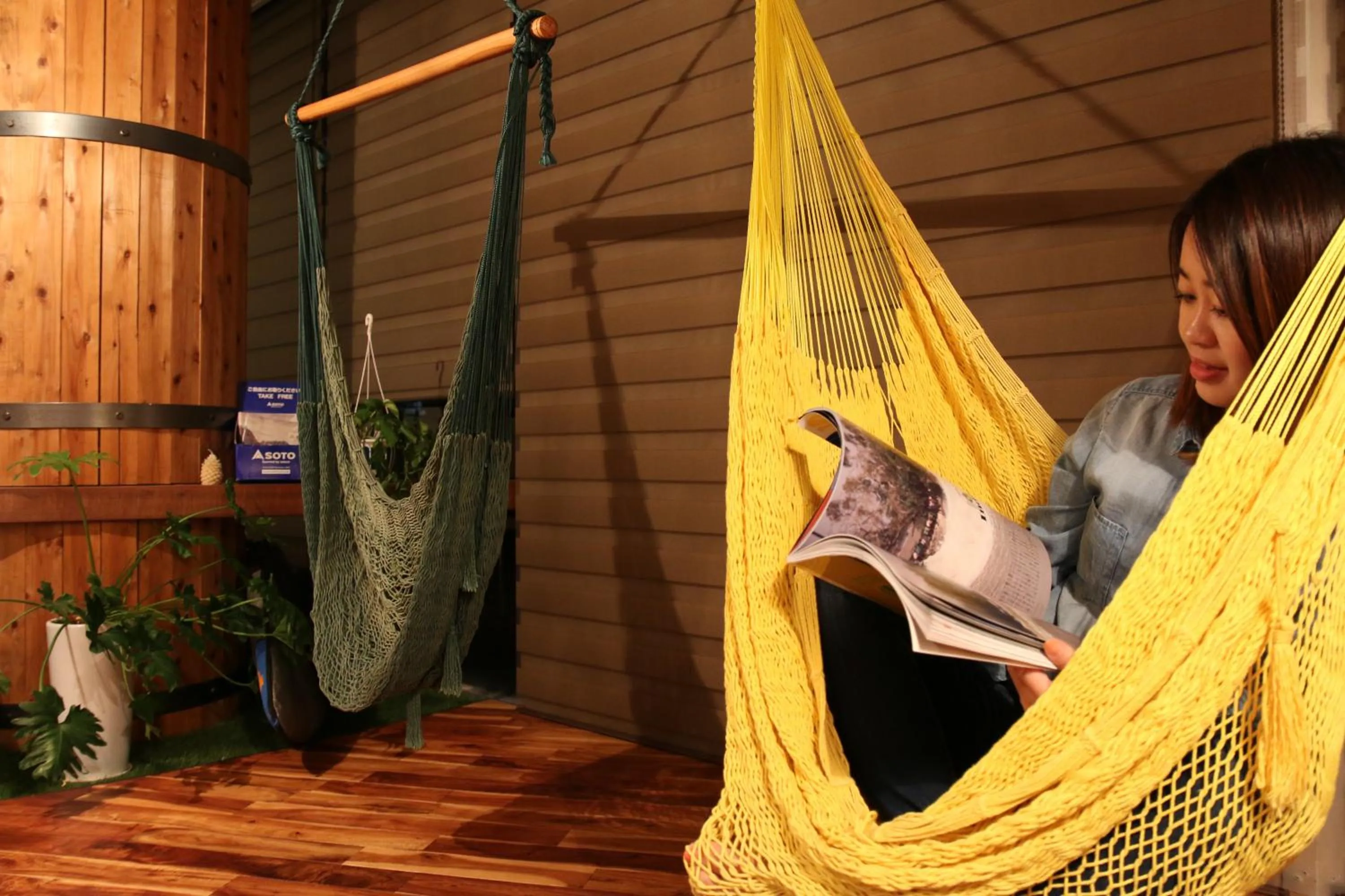 Communal lounge/ TV room in 365BASE outdoor hostel