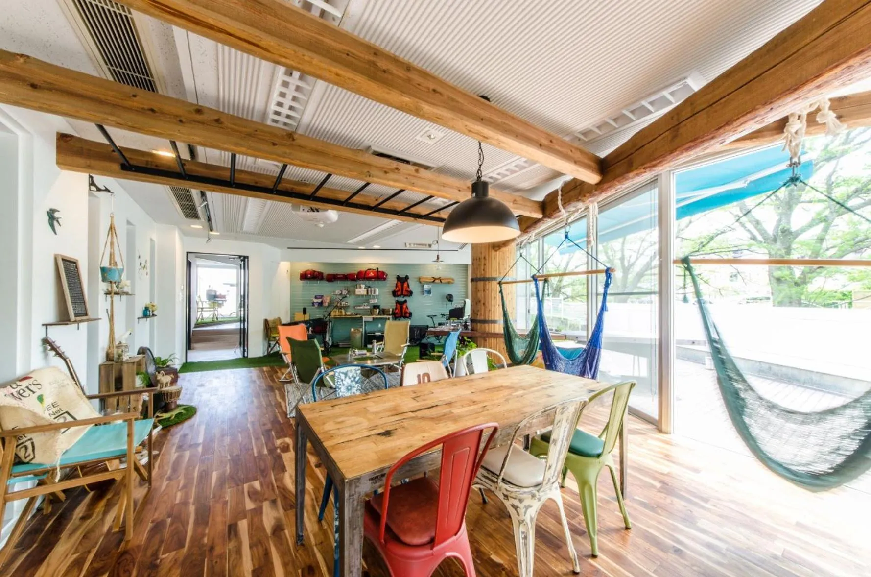 Communal lounge/ TV room in 365BASE outdoor hostel