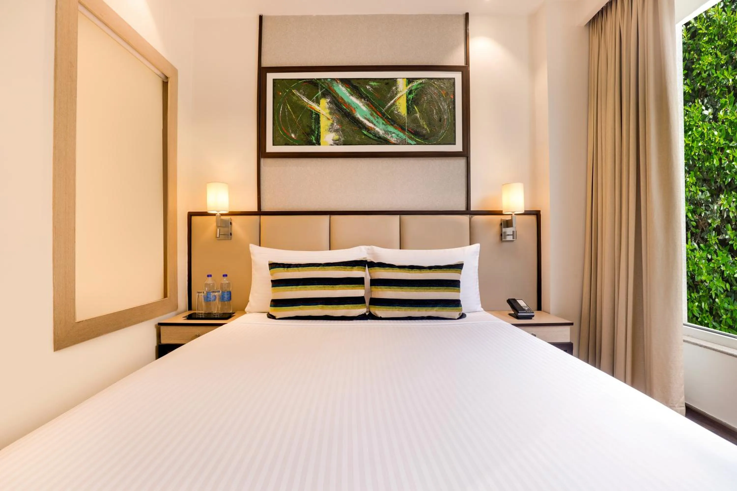Bedroom, Bed in Sandal Suites by Lemon Tree Hotels
