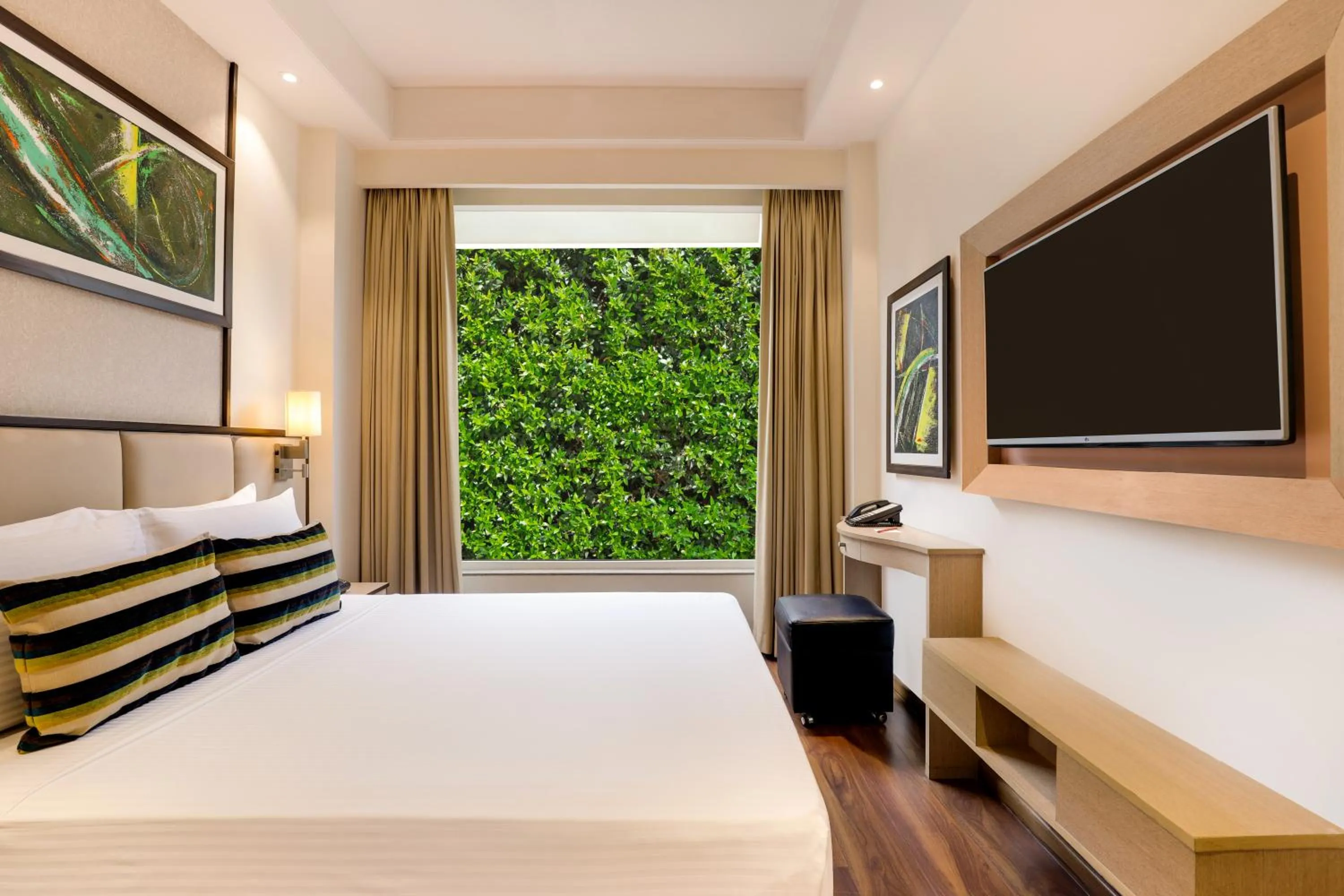 Bedroom, Bed in Sandal Suites by Lemon Tree Hotels