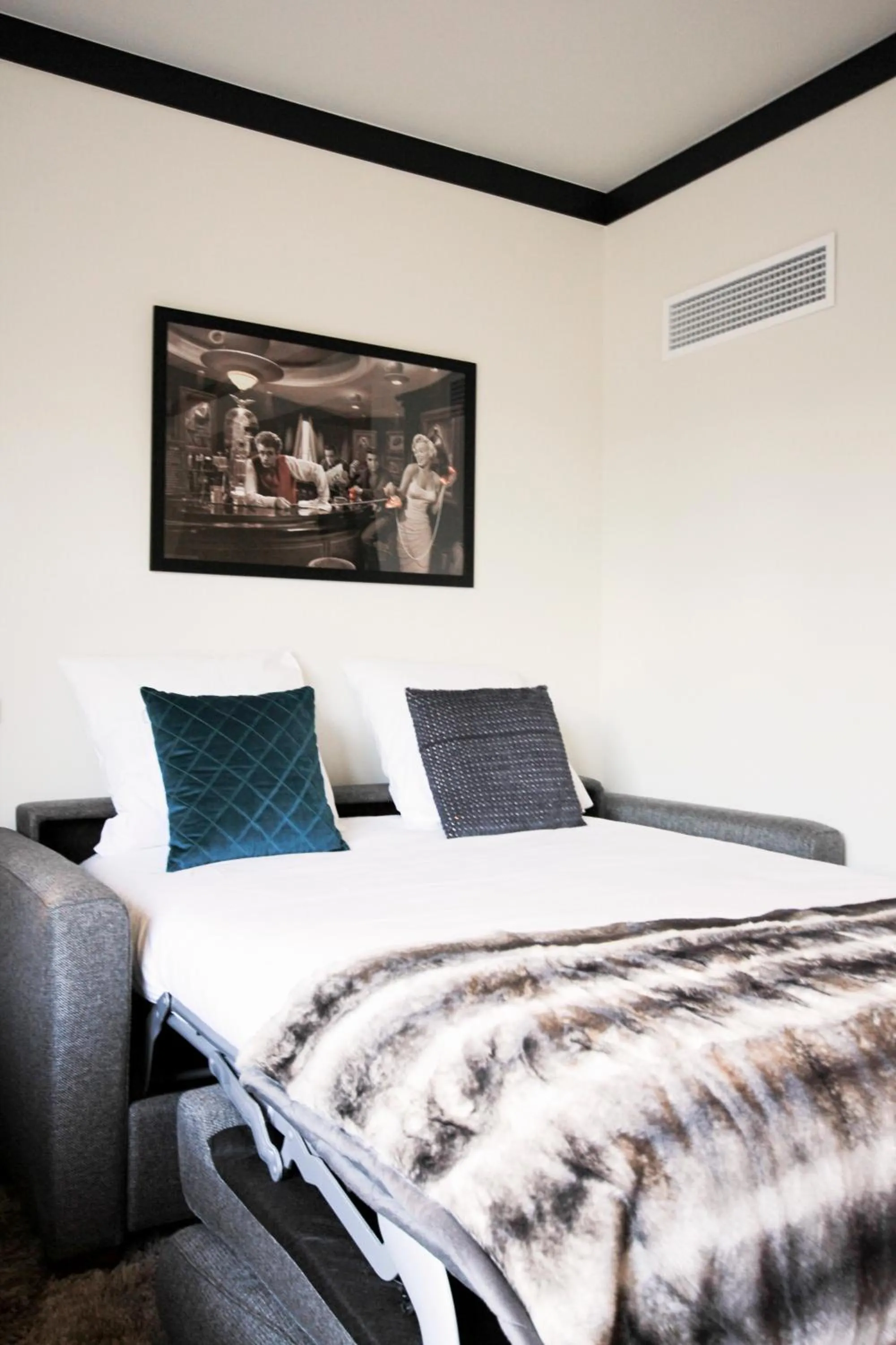 Seating area, Bed in Getaway Brussels Airport