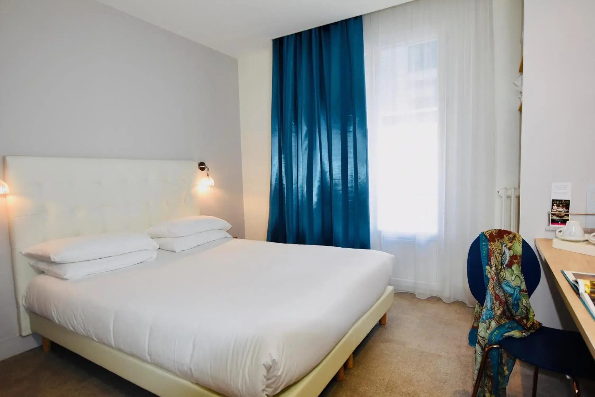 Bed in Hôtel Escale Oceania Lorient Bed in Hôtel Escale Oceania Lorient