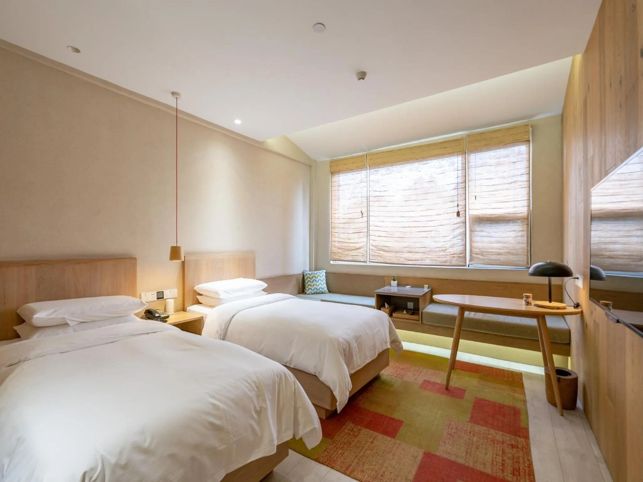 Photo of the whole room, Bed in EBO Hotel Zijin gang Asian Games Park Store Zhejiang university