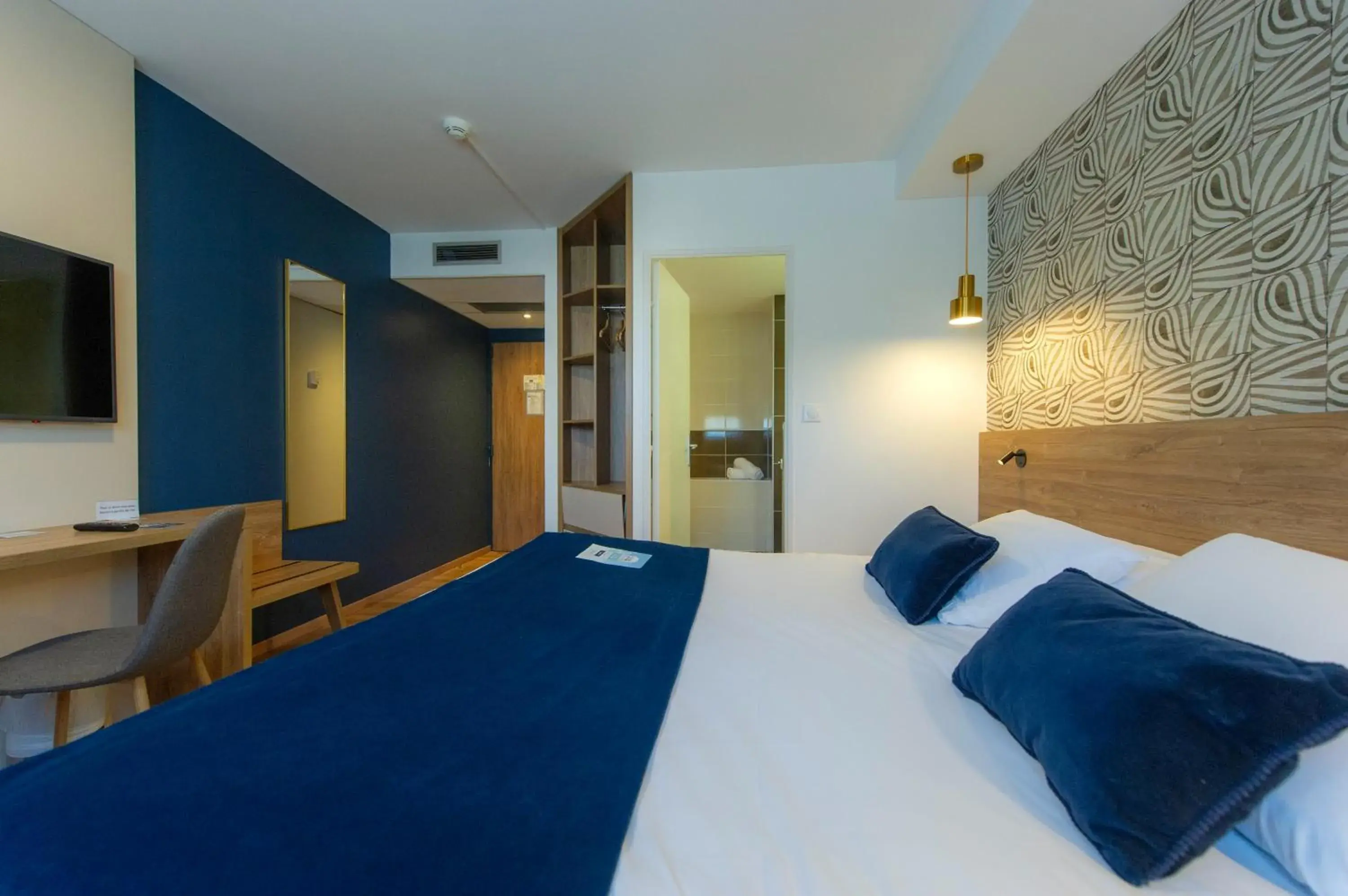 Bed in Kyriad Montpellier Est - Lunel Bed in Kyriad Montpellier Est - Lunel