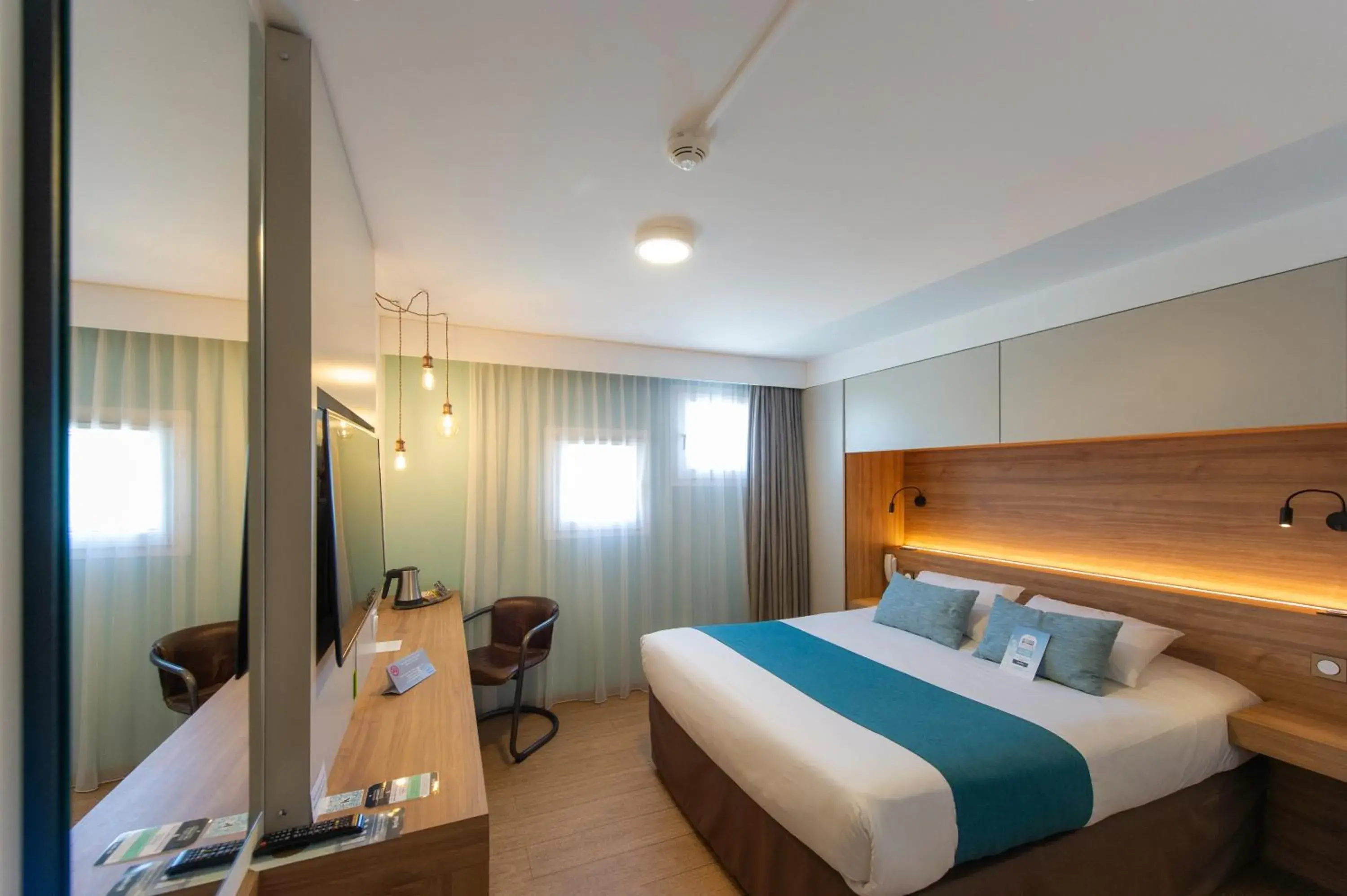 Bed in Kyriad Montpellier Est - Lunel Bed in Kyriad Montpellier Est - Lunel