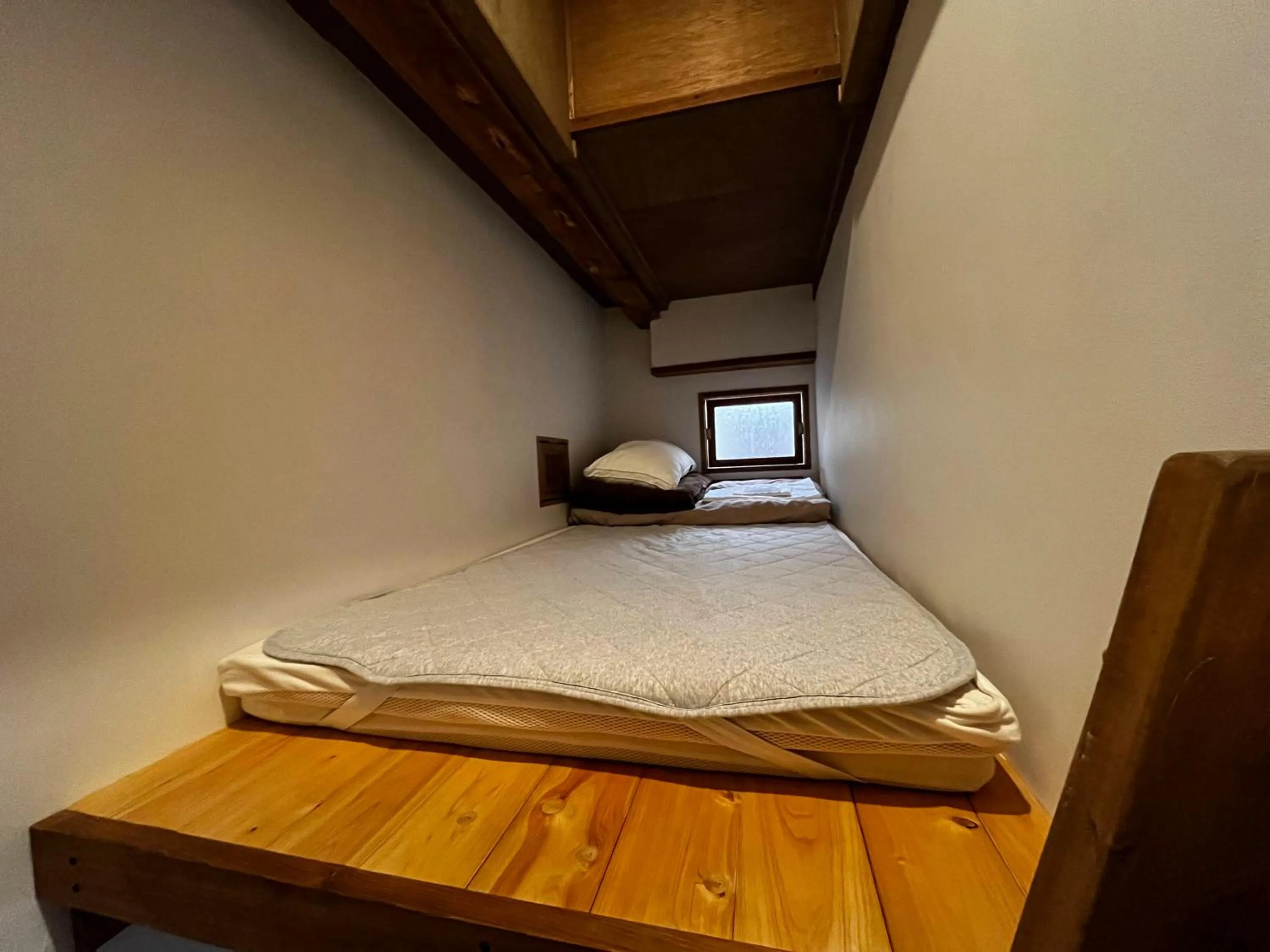 Photo of the whole room, Bed in Taketa Ekimae Hostel cue