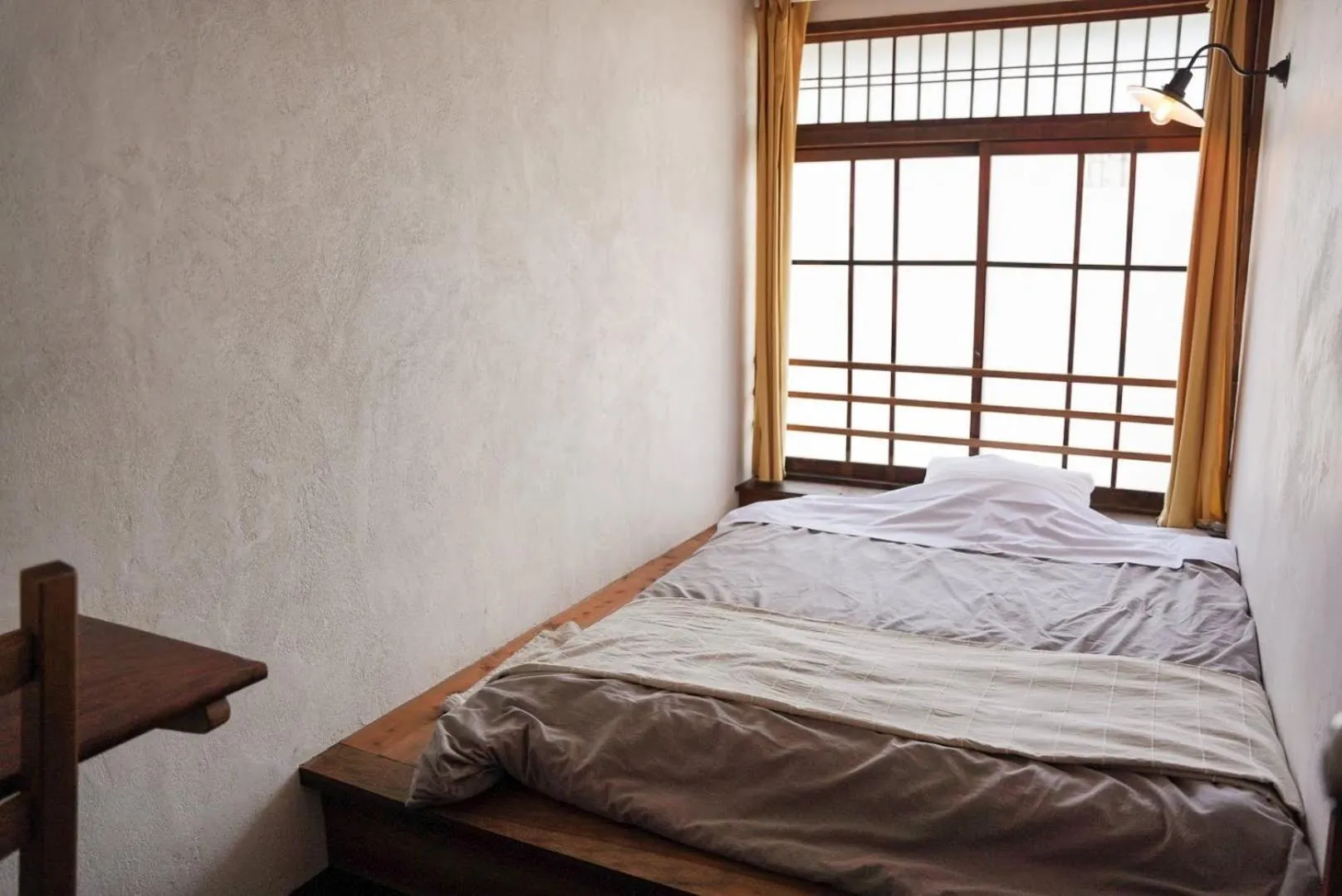 Bed in Taketa Ekimae Hostel cue