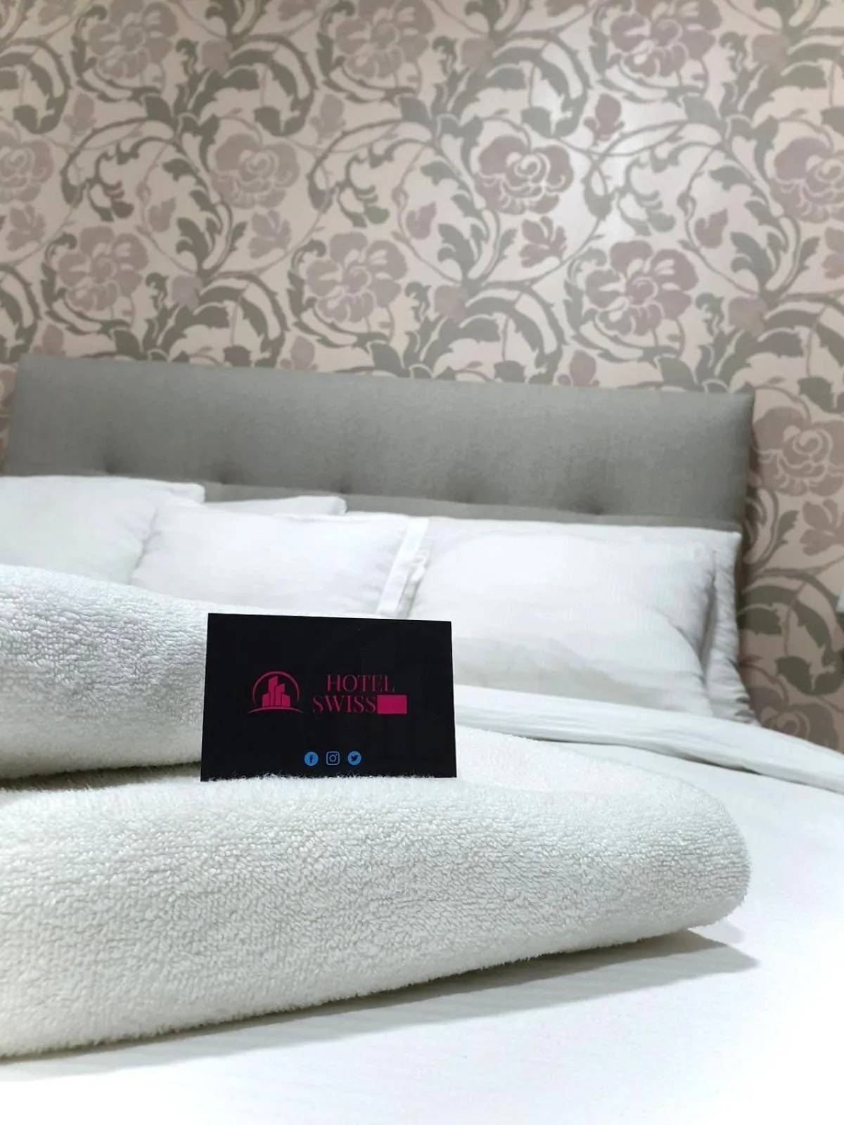 Bed in Swiss Plus Hotel