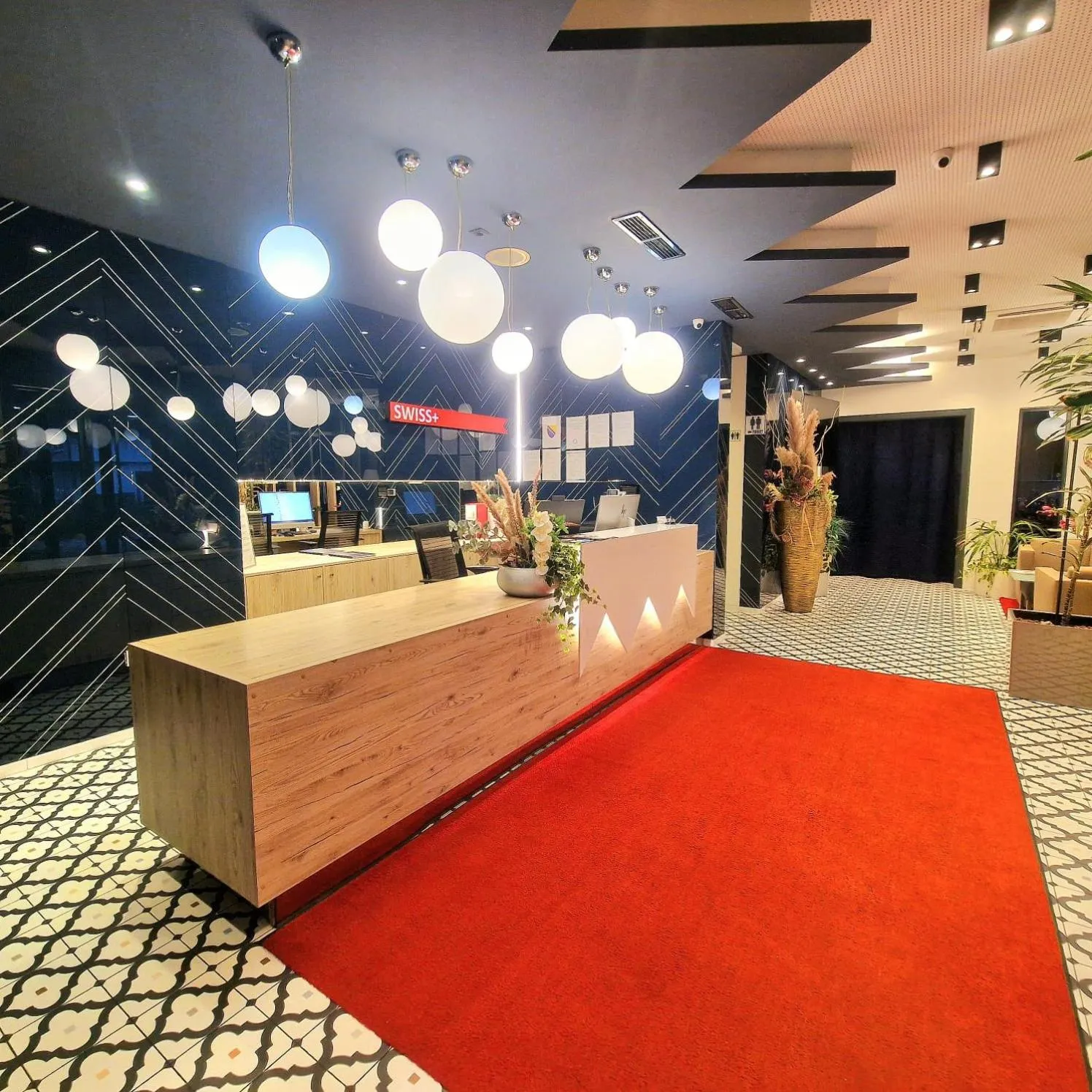 Lobby or reception in Swiss Plus Hotel