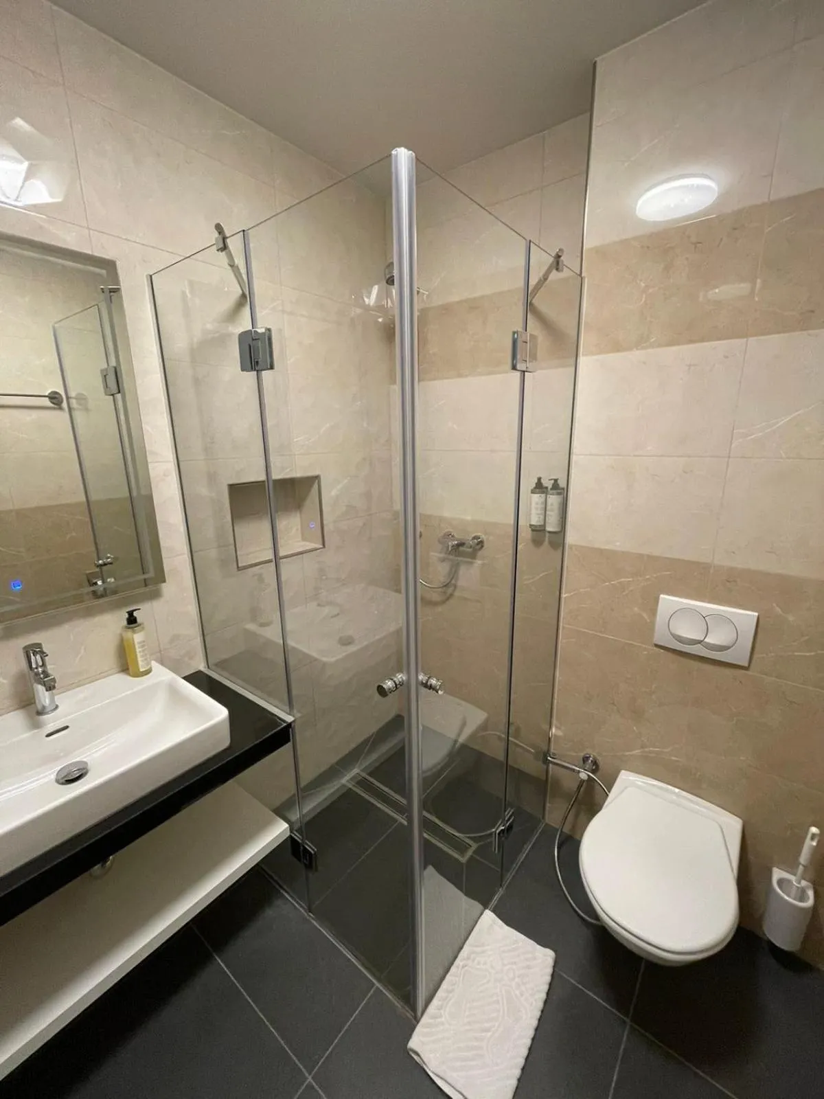 Shower in Swiss Plus Hotel