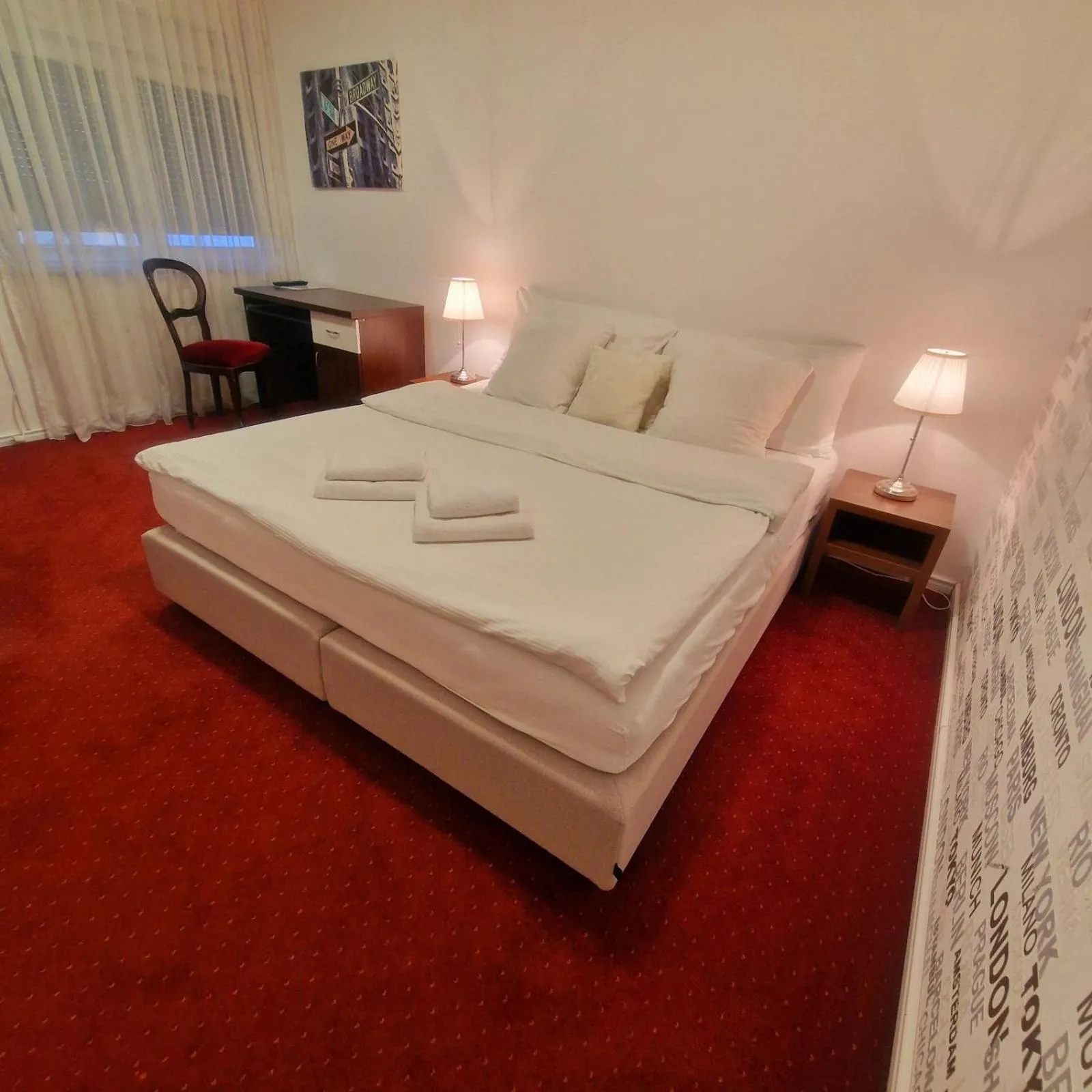 Bed in Swiss Plus Hotel