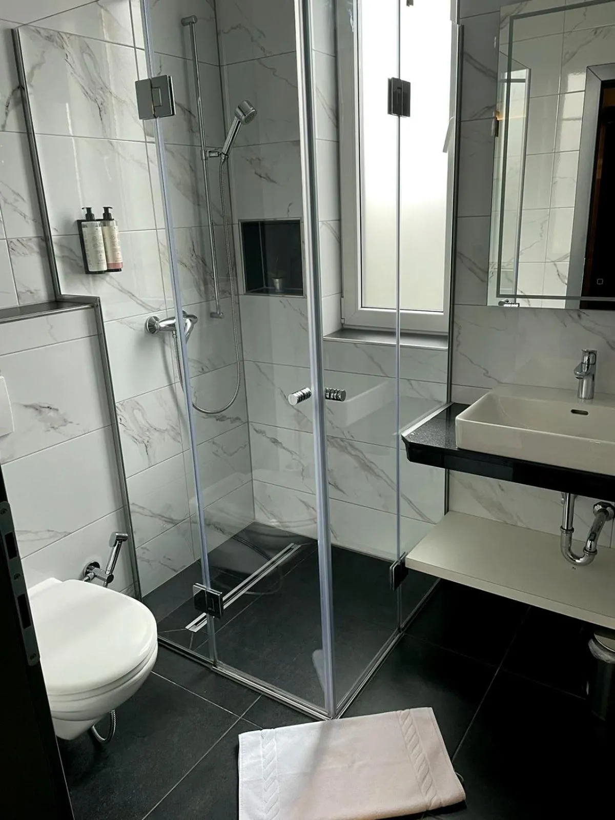 Shower in Swiss Plus Hotel