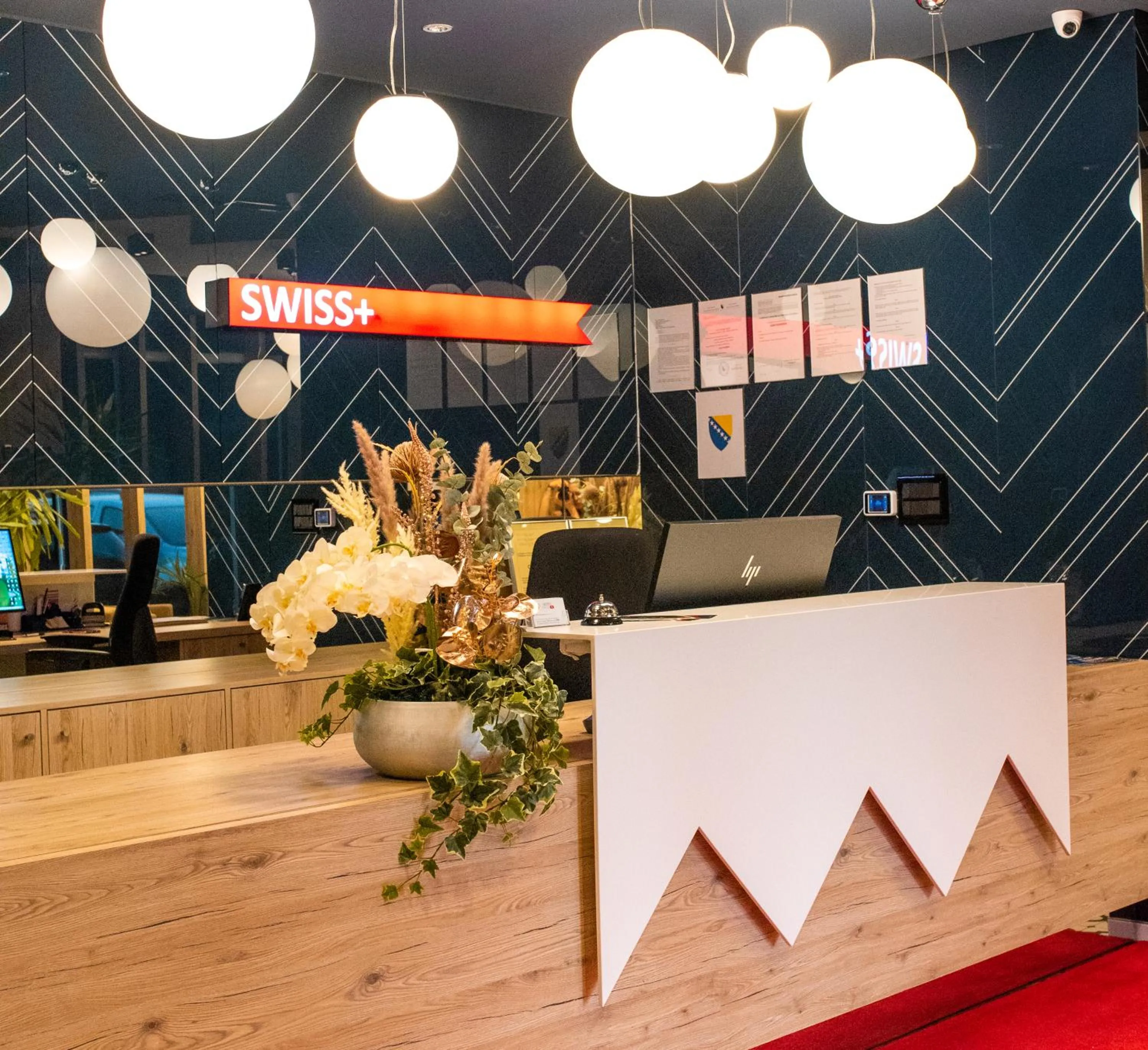Lobby or reception in Swiss Plus Hotel
