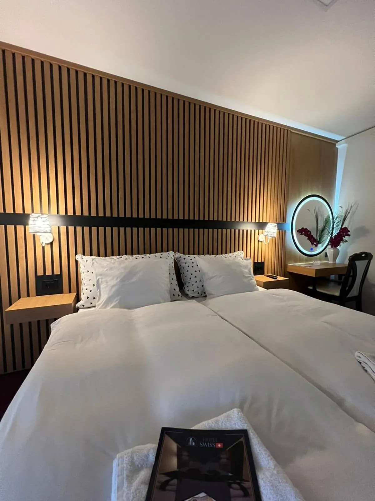 Bed in Swiss Plus Hotel