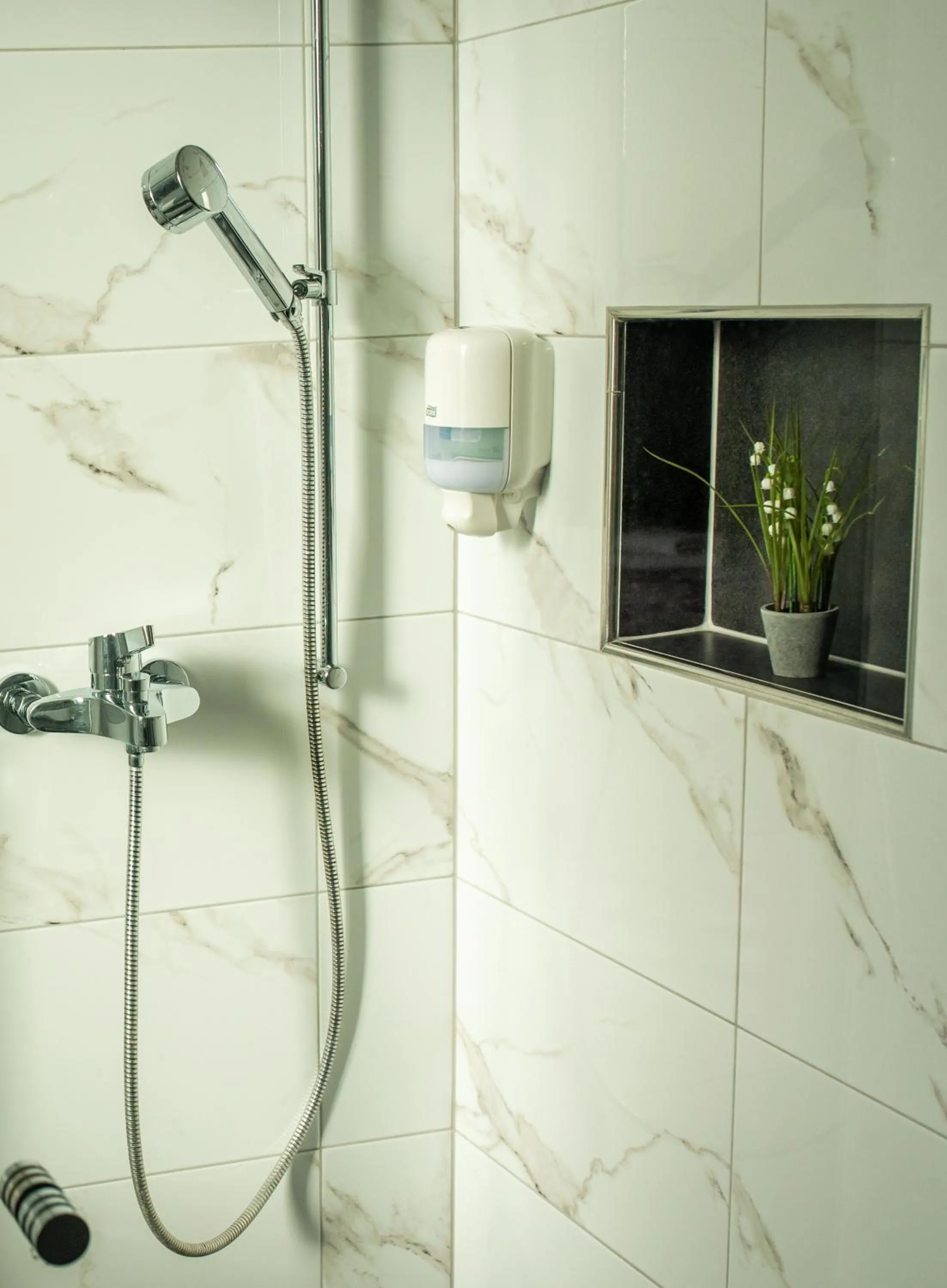 Bathroom in Swiss Plus Hotel