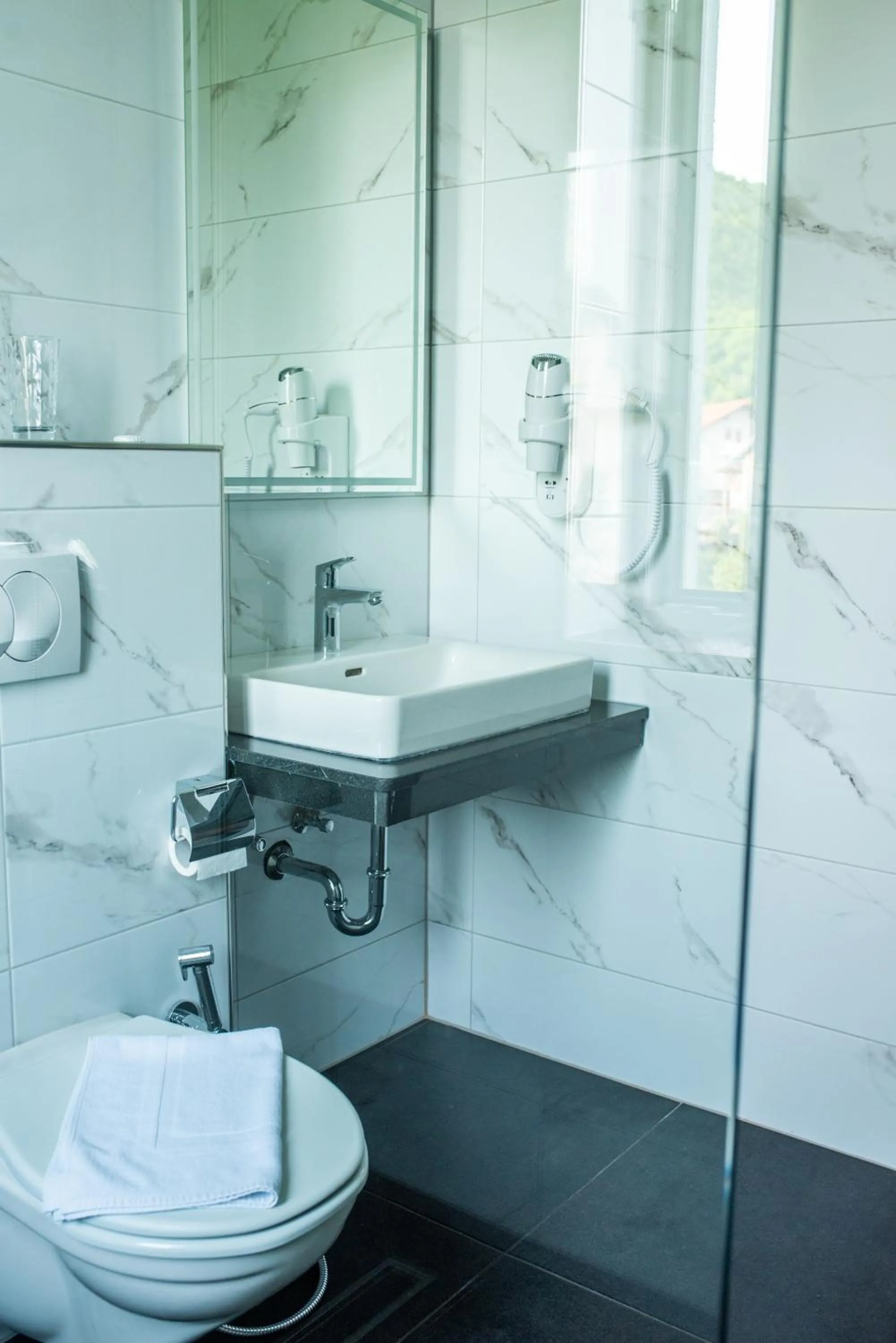 Shower in Swiss Plus Hotel