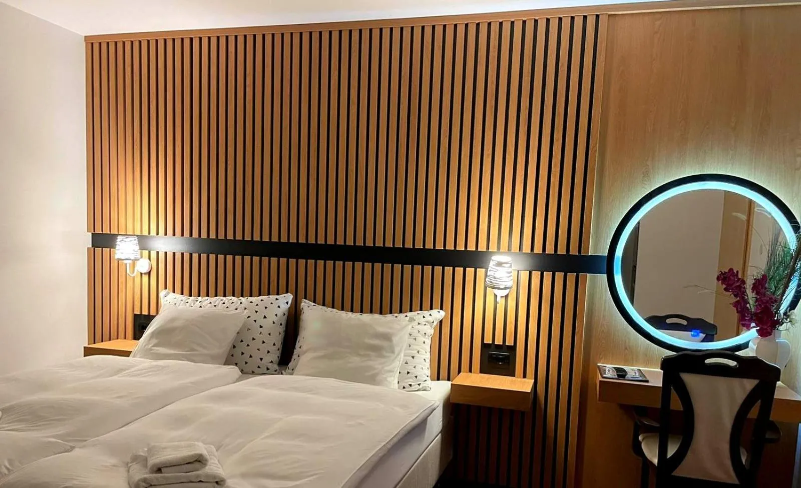 Bed in Swiss Plus Hotel