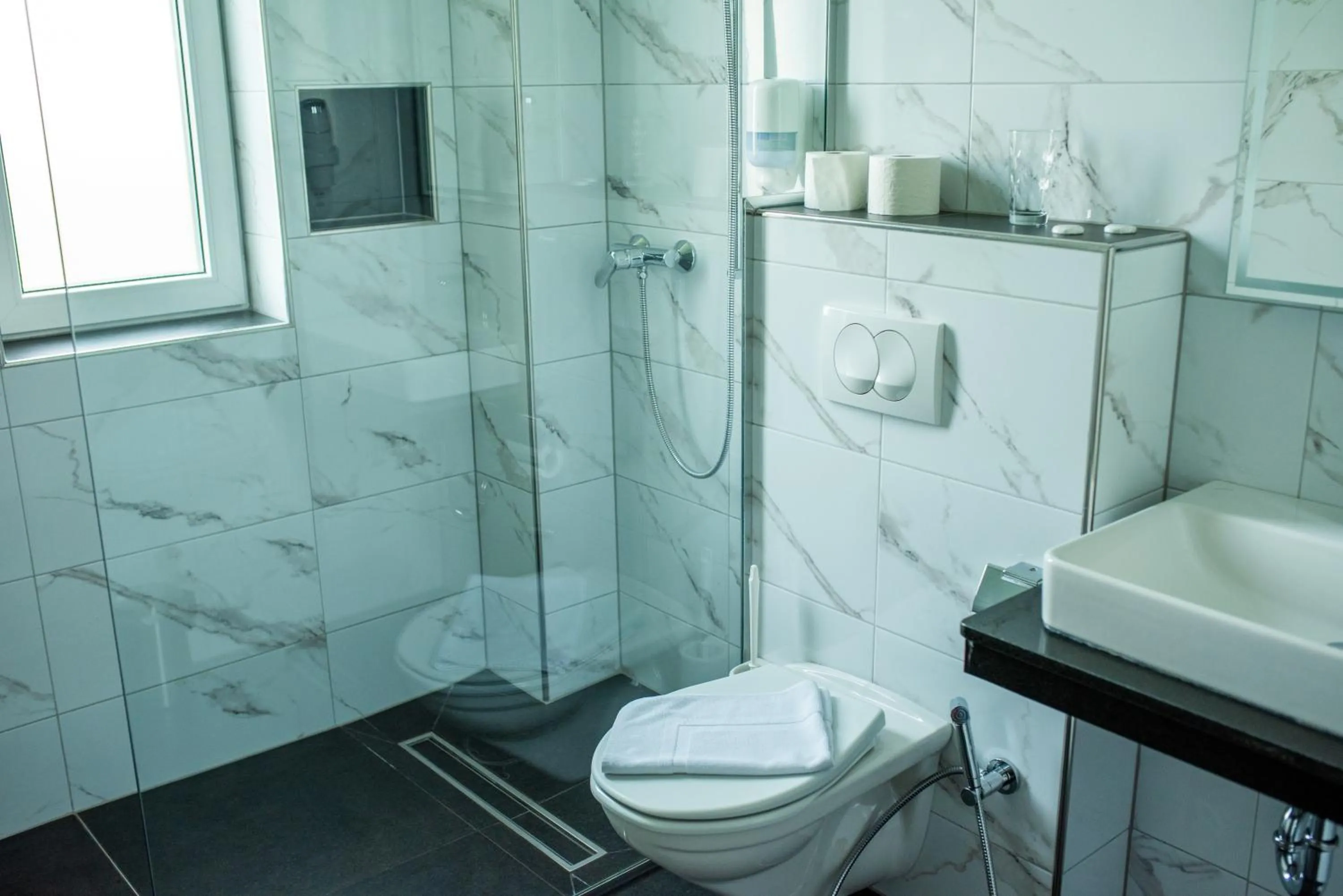 Shower in Swiss Plus Hotel