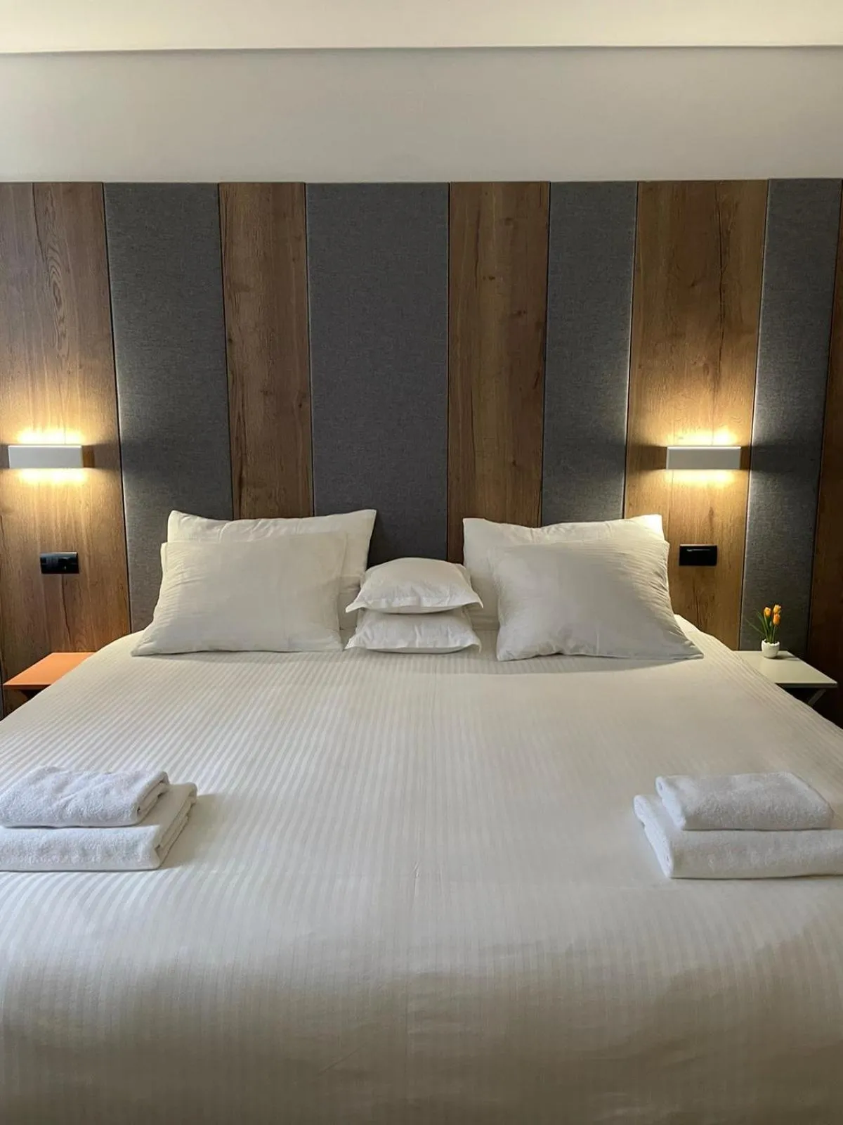 Bed in Swiss Plus Hotel