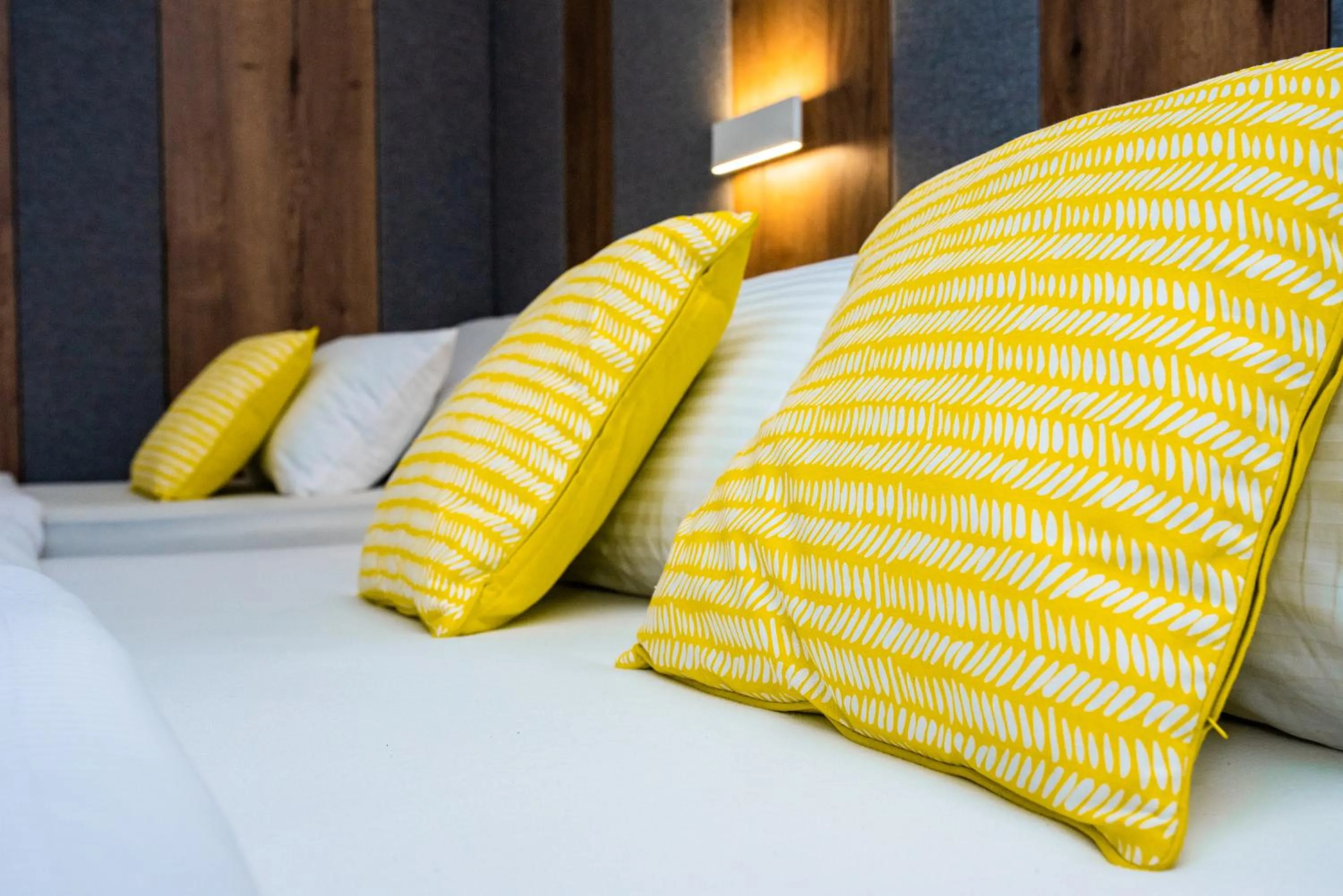 Bed in Swiss Plus Hotel