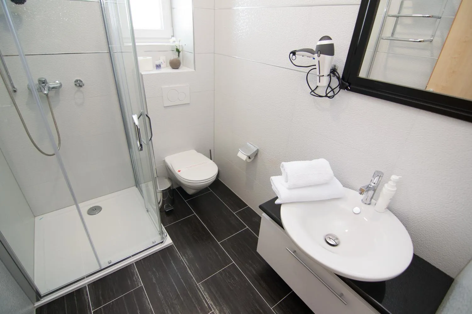 Shower in Swiss Plus Hotel