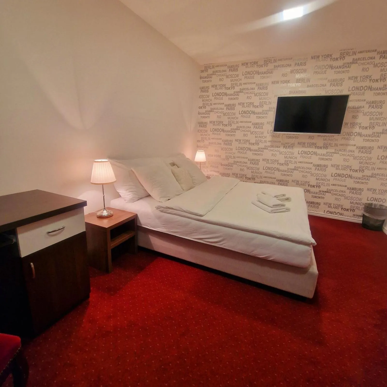 Bed in Swiss Plus Hotel