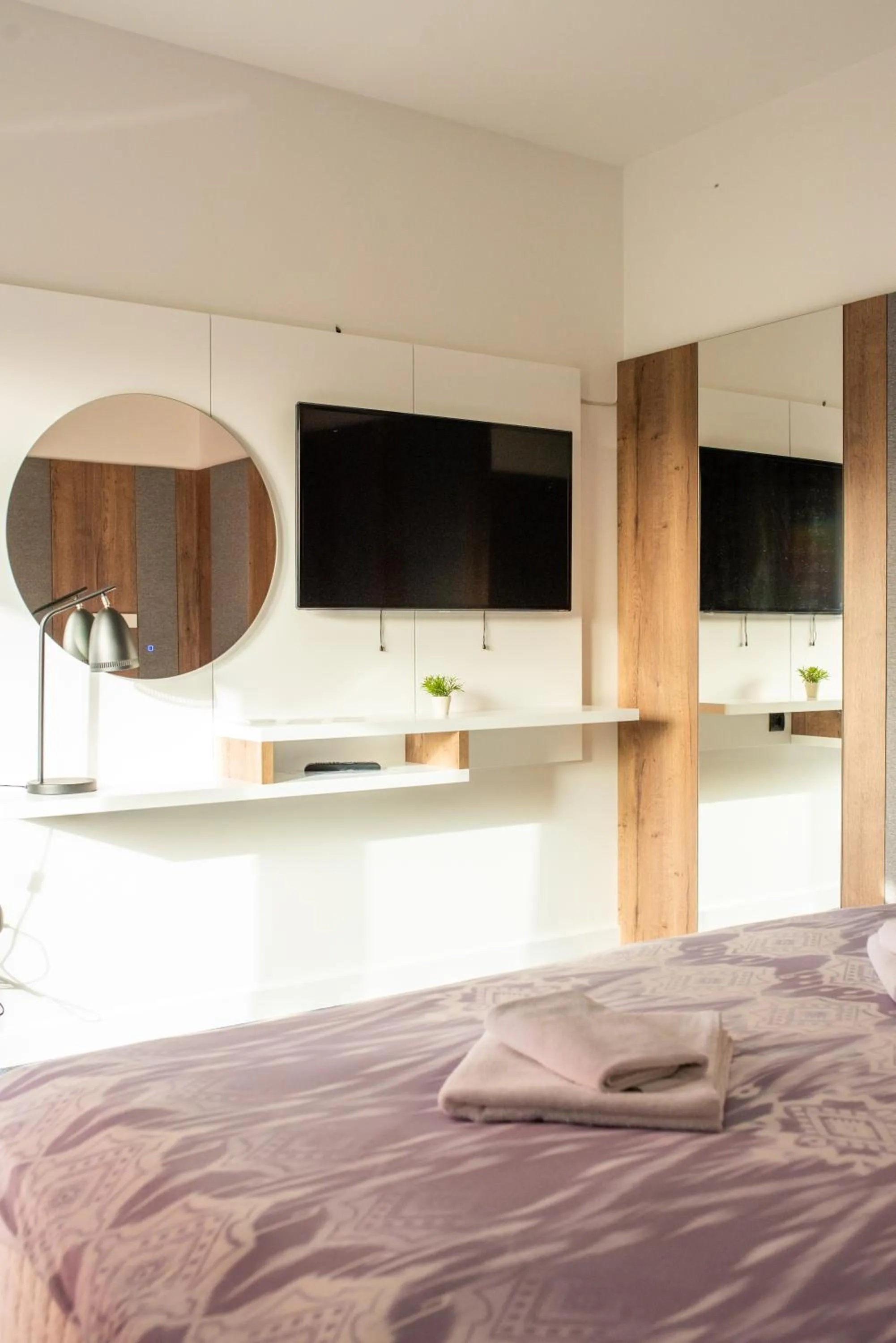Bed in Swiss Plus Hotel