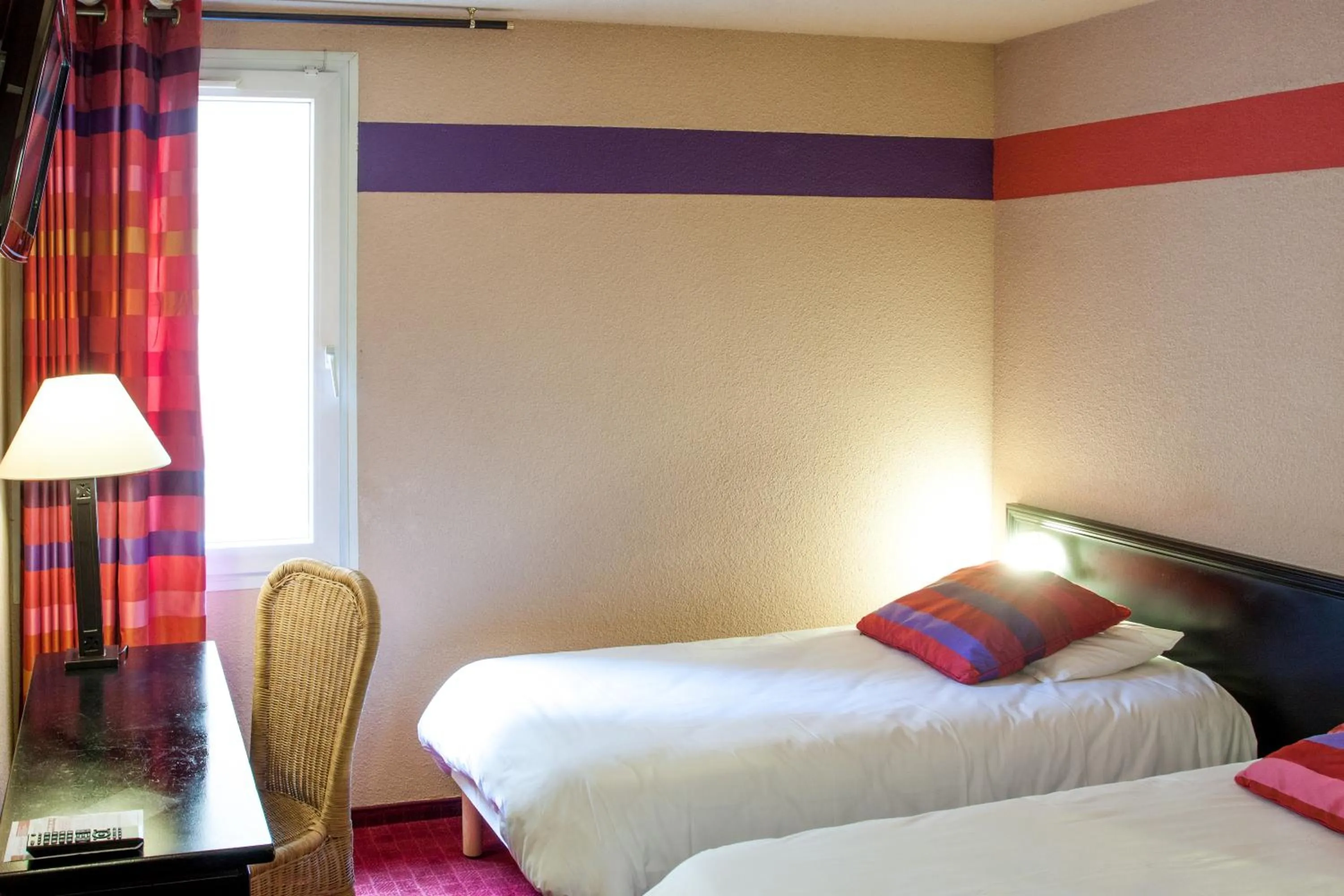 Bed in Hôtel Saint Sauveur