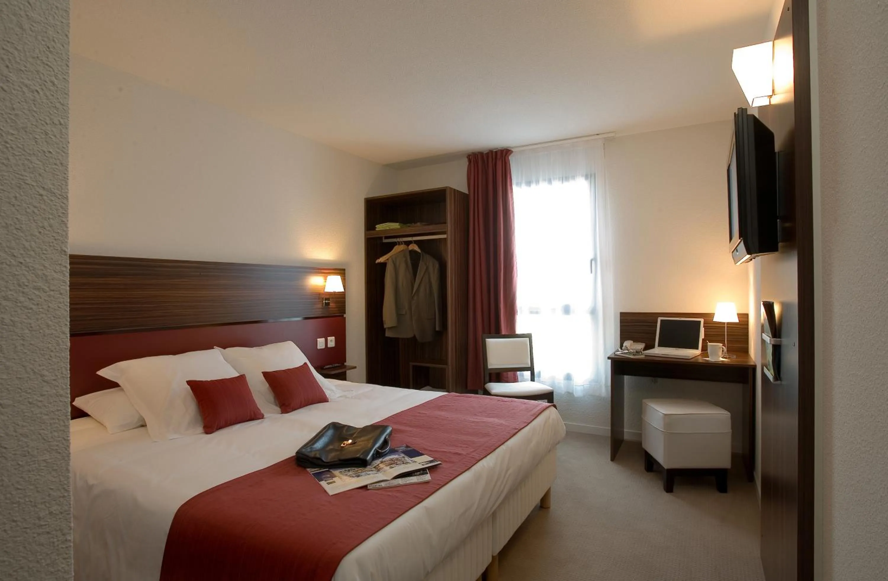 Bed in Hôtel Le Palladior Voiron