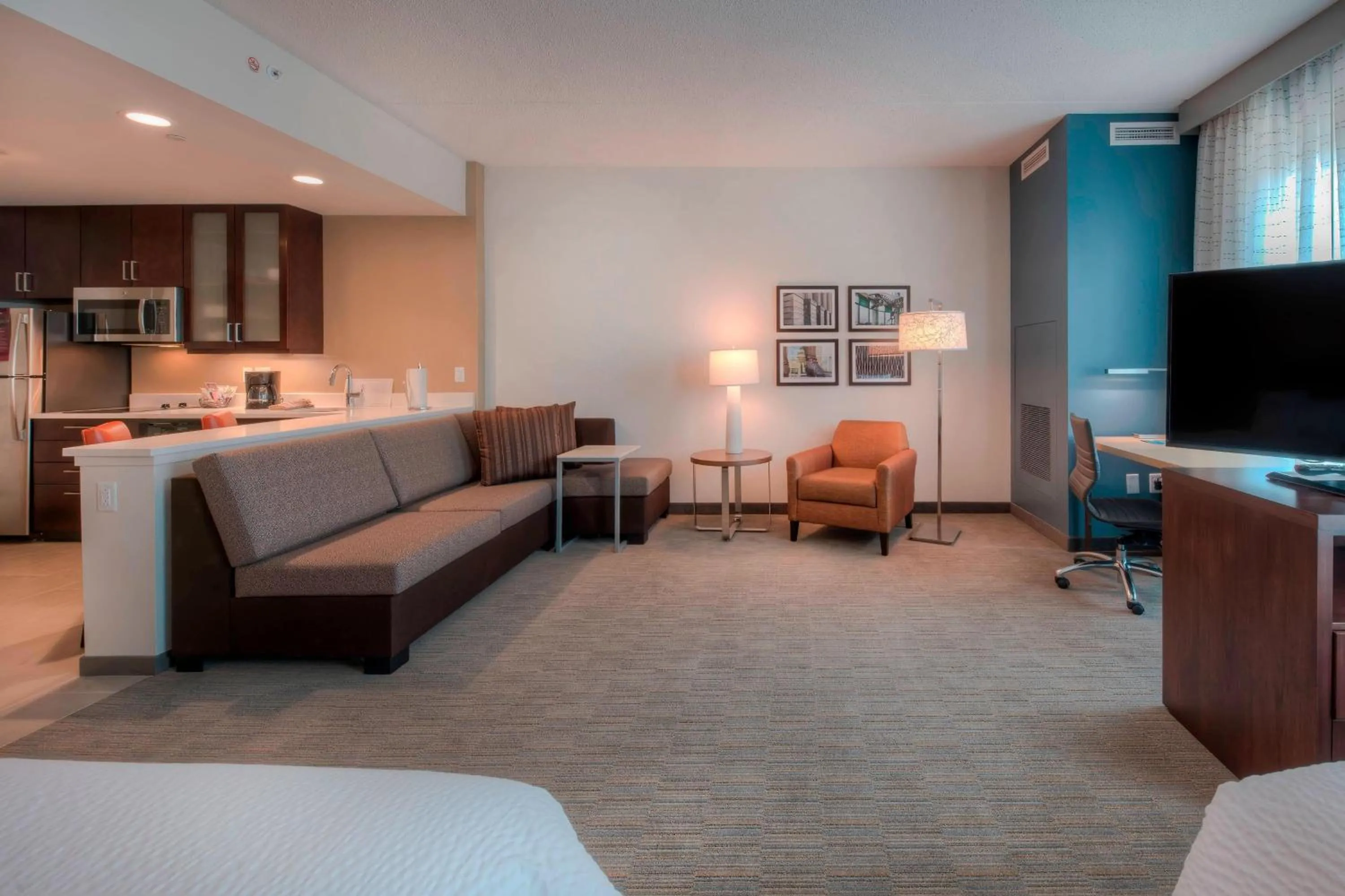 Living room, Bed in Residence Inn by Marriott Raleigh Downtown