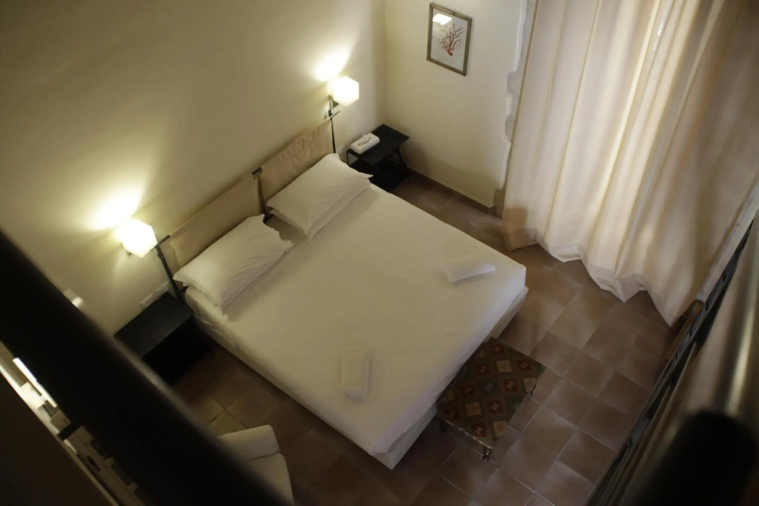 Photo of the whole room, Bed in Lanterne Magiche Ortigia Photo of the whole room, Bed in Lanterne Magiche Ortigia