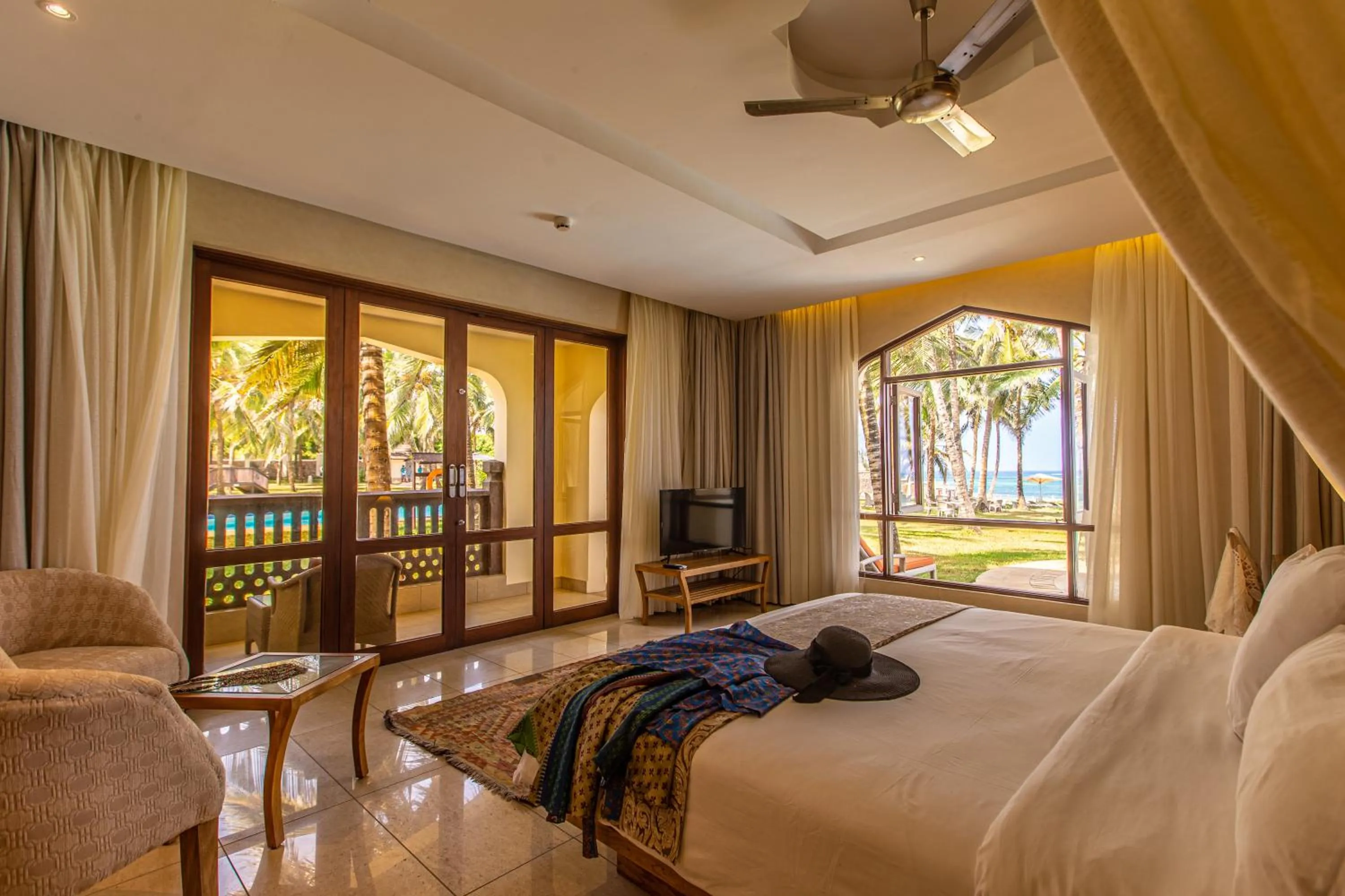 Bed in Silver Palm Spa & Resort