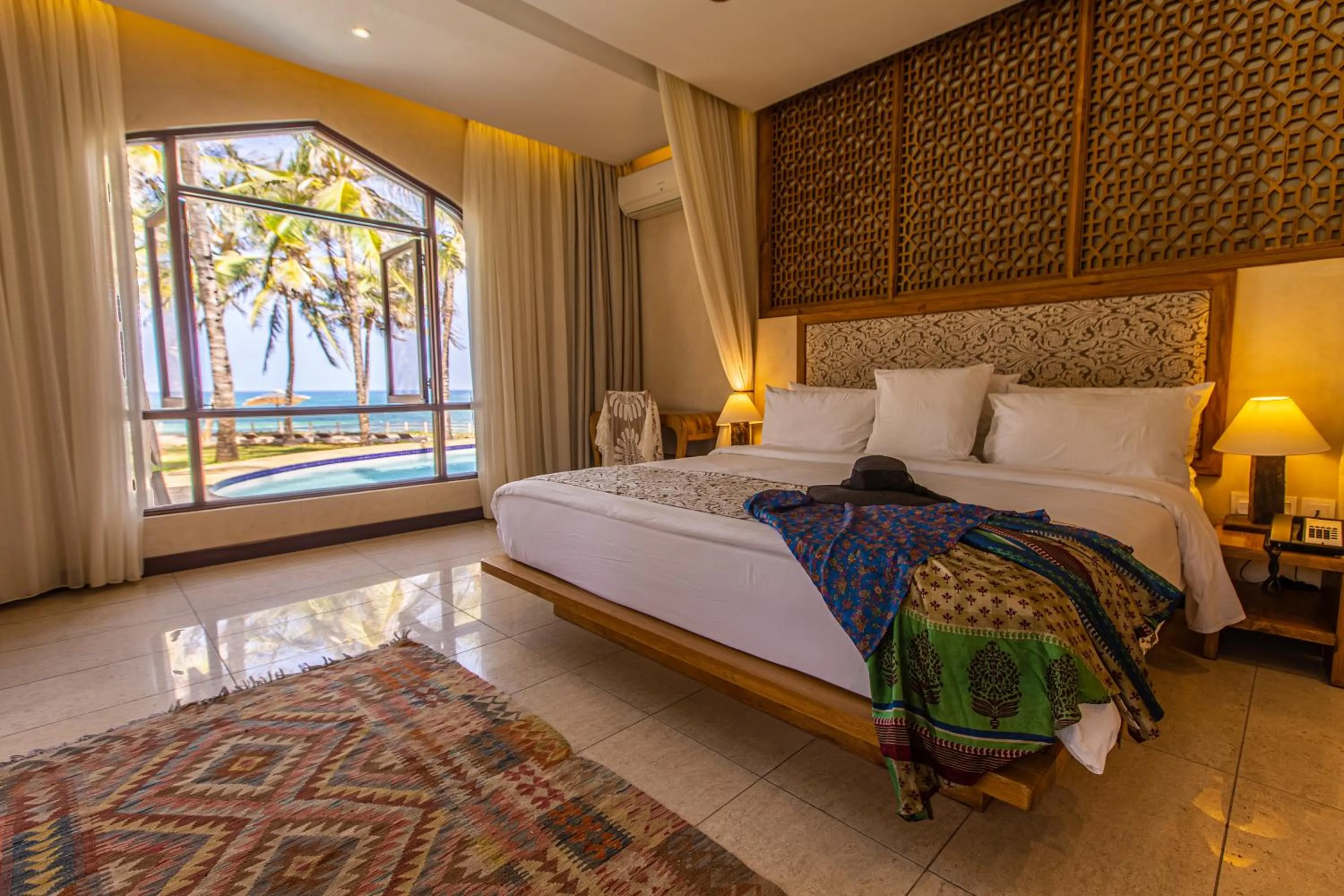 Bed in Silver Palm Spa & Resort