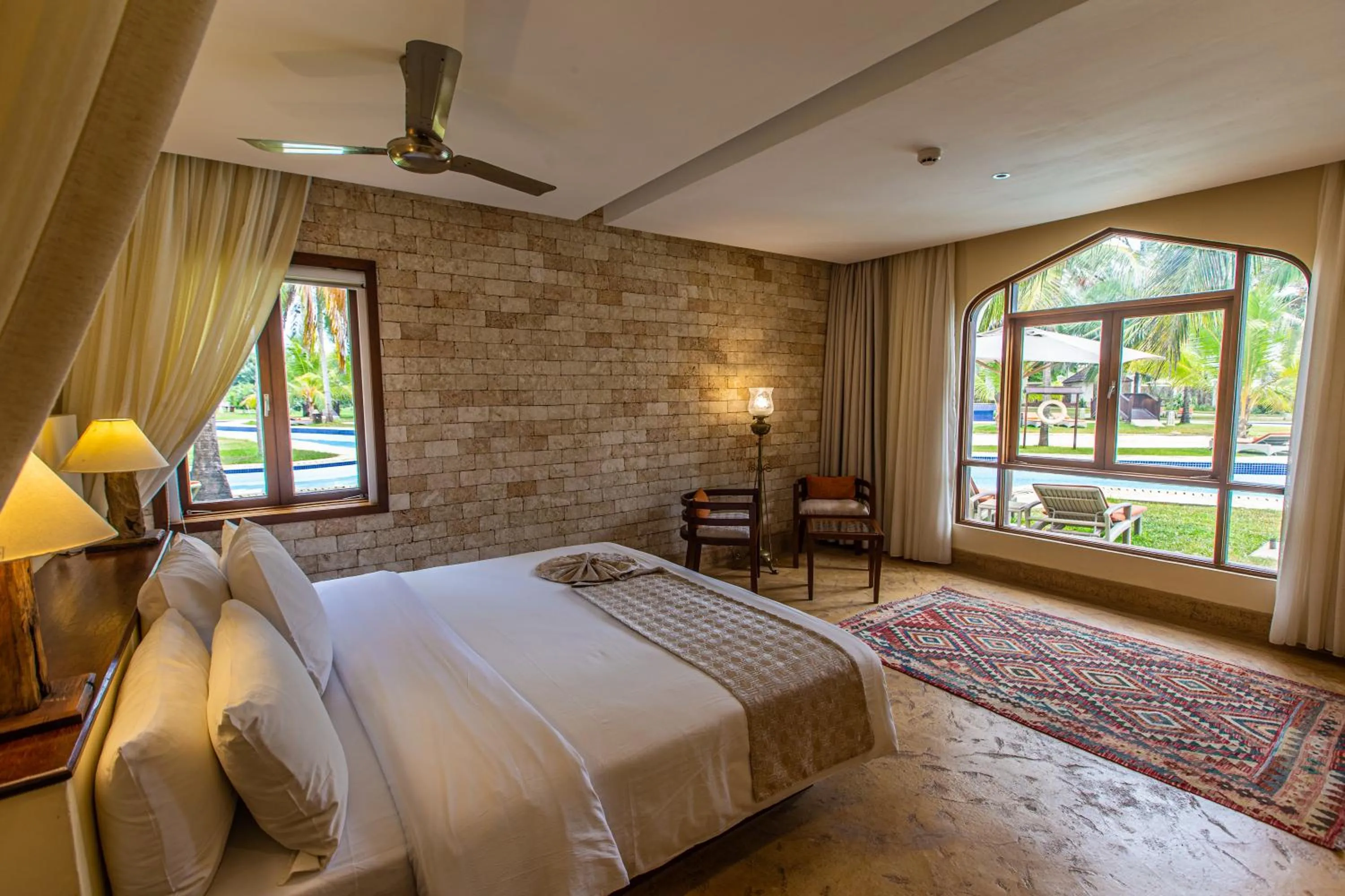 Bed in Silver Palm Spa & Resort