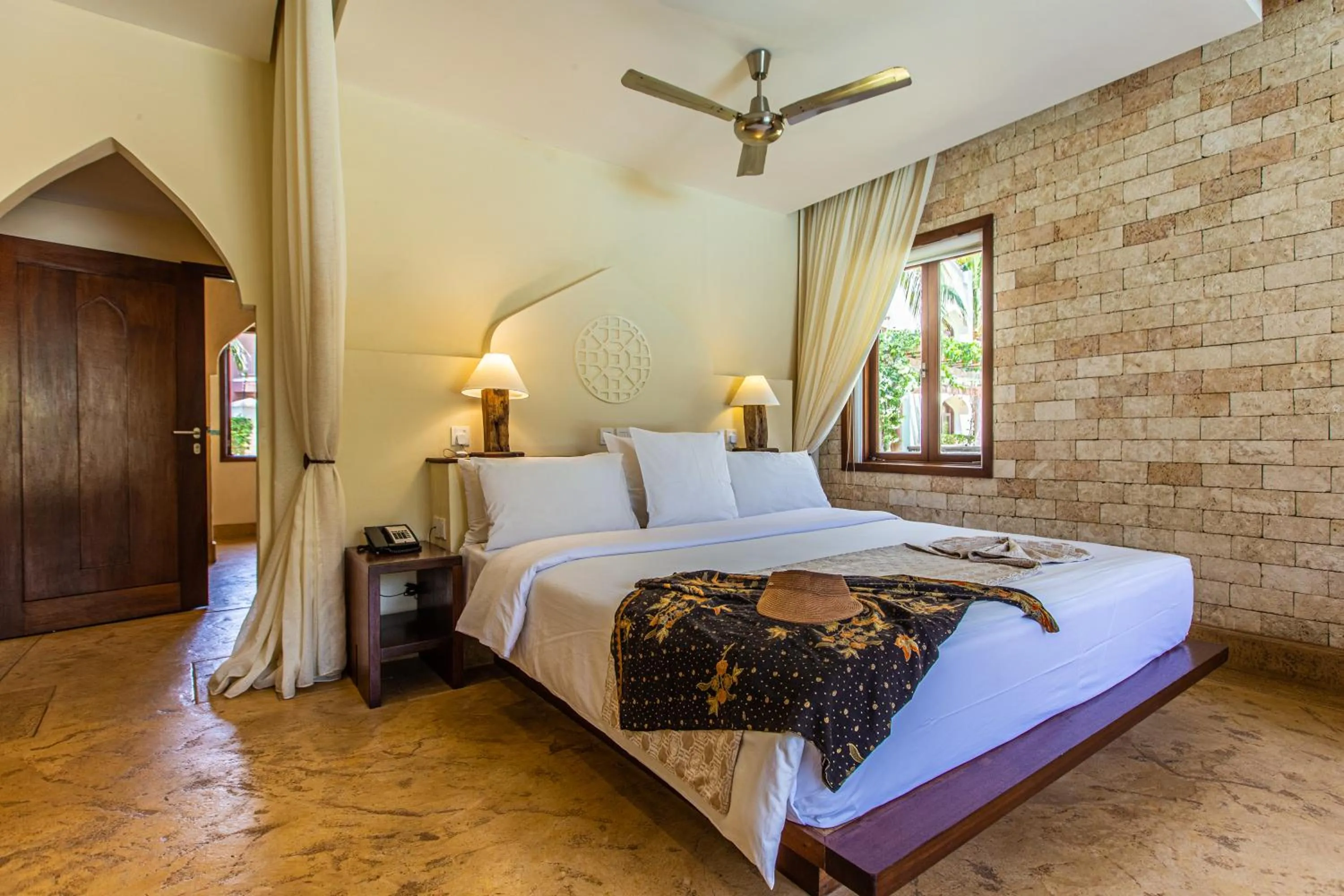 Bed in Silver Palm Spa & Resort