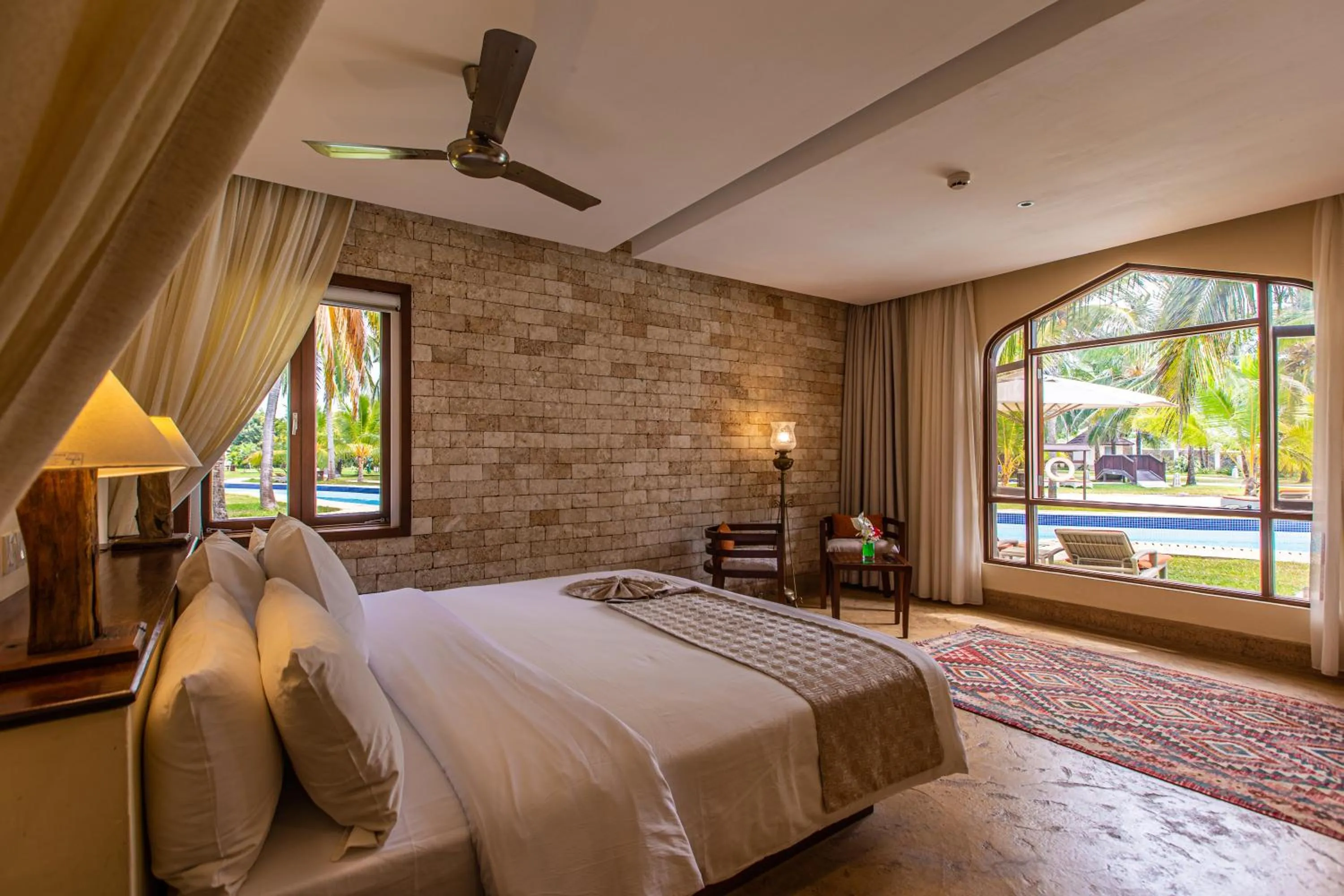 Bed in Silver Palm Spa & Resort