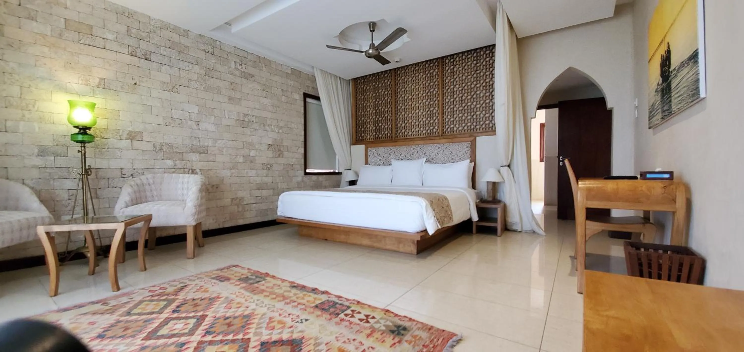 Bed in Silver Palm Spa & Resort