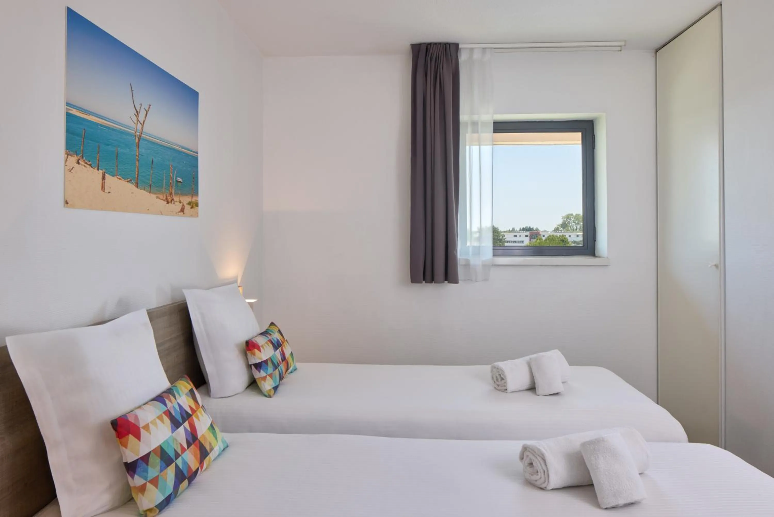 Bed in Zenitude Hôtel-Résidences Bordeaux Aéroport Mérignac