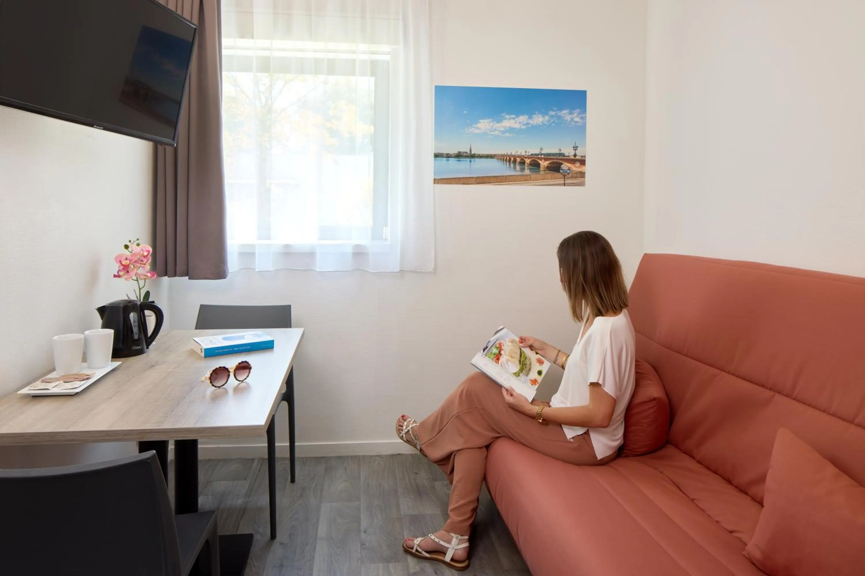 Living room in Zenitude Hôtel-Résidences Bordeaux Aéroport Mérignac