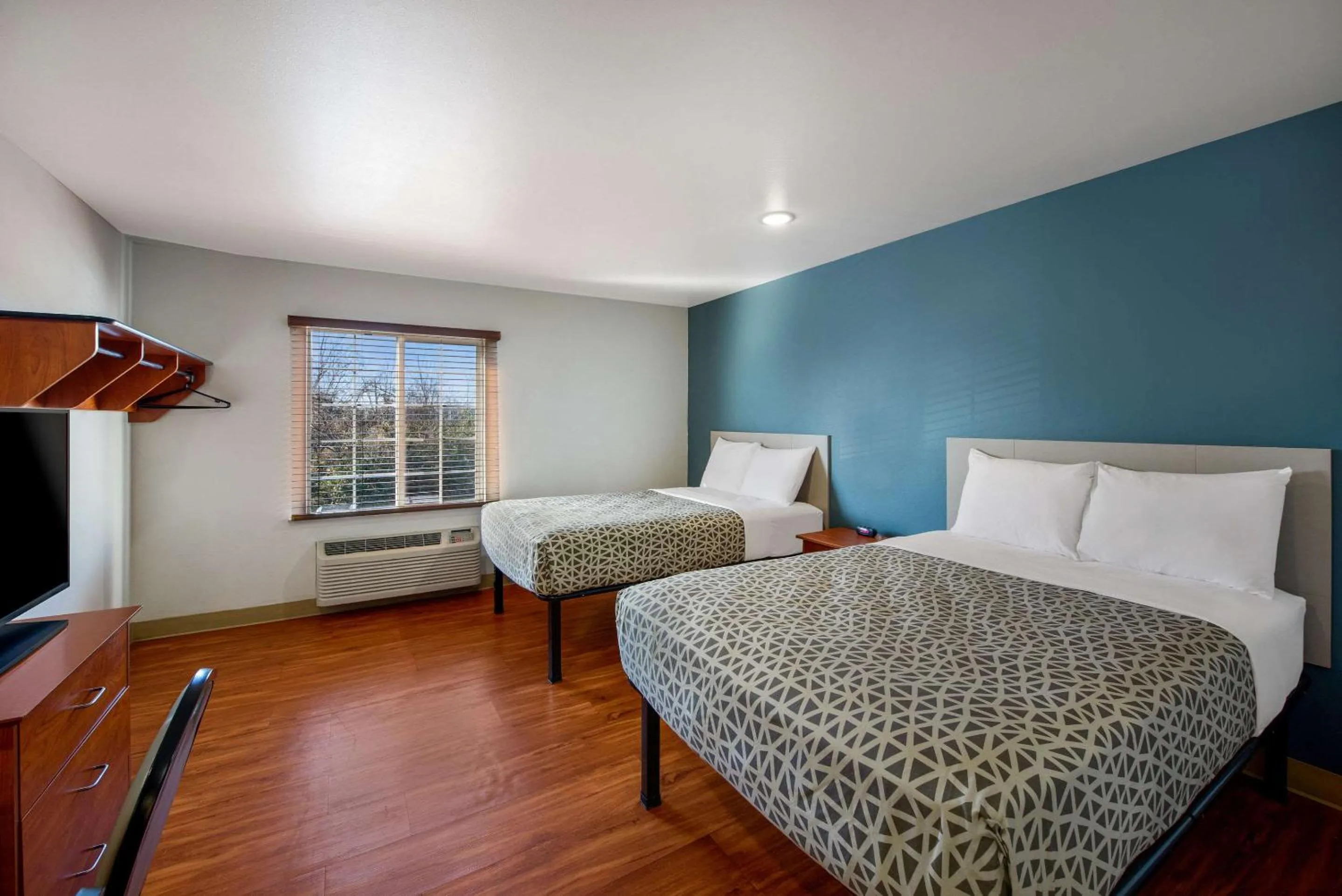 Bedroom, Bed in WoodSpring Suites Columbus Southeast